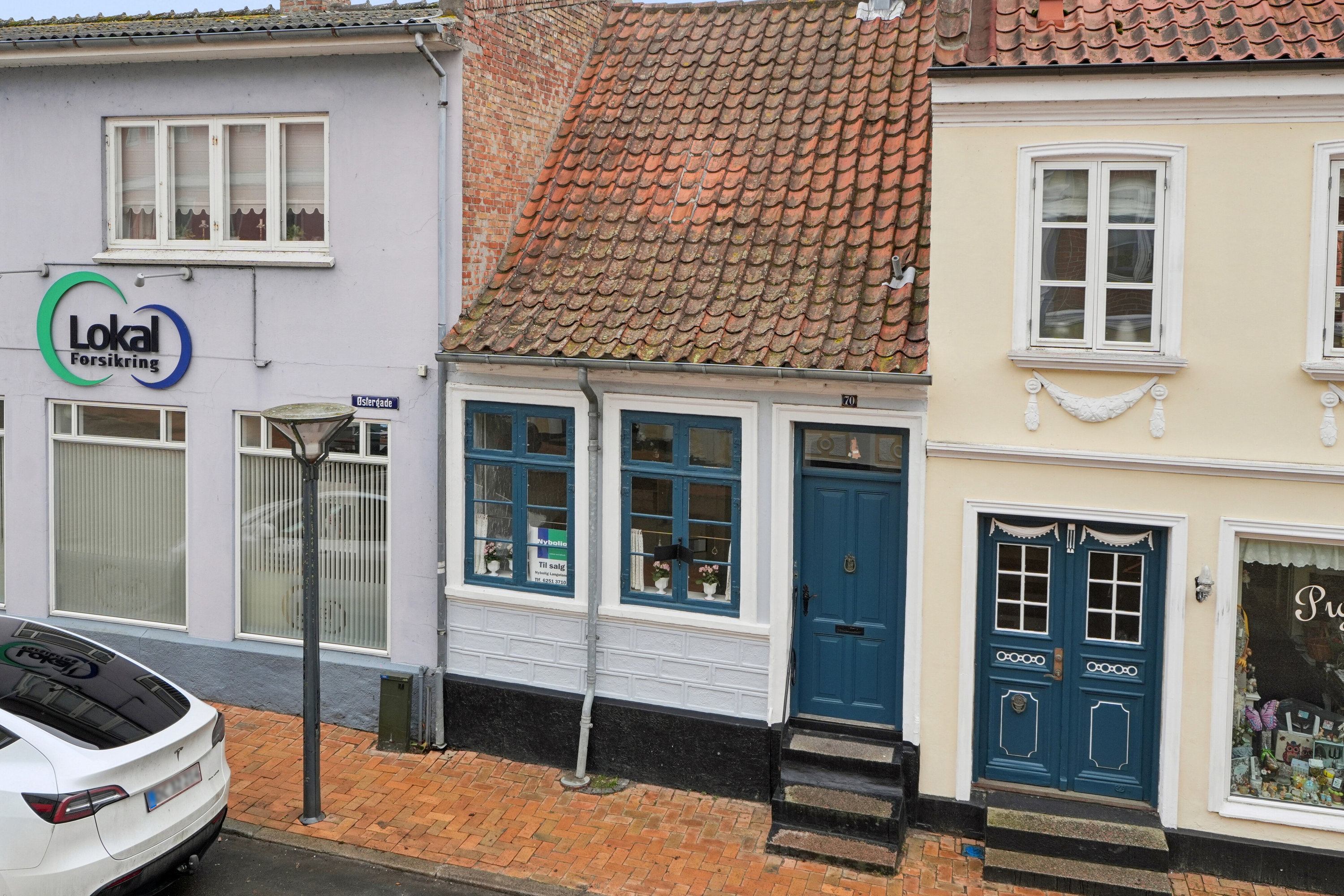 Fremhævet set fra vejen billede i fuldskærmstilstand. Billede af Østergade 70, 5900 Rudkøbing
