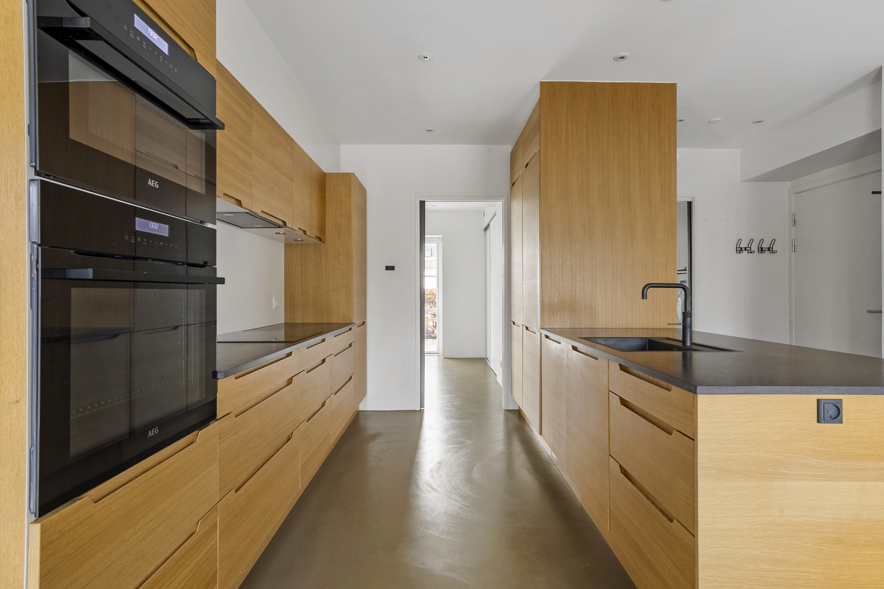 Fremhævet køkken billede i fuldskærmstilstand. Billede af Aastrupvej 11C, st.. th., 6100 Haderslev