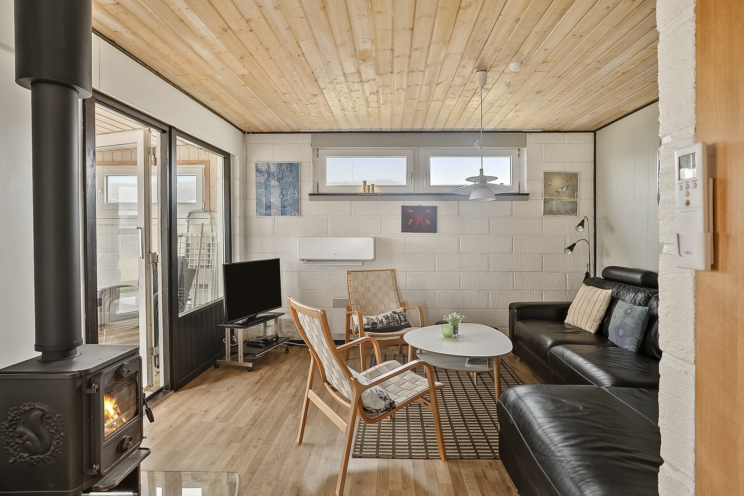 Fremhævet stue billede i fuldskærmstilstand. Billede af Bjerghuse 35, 6990 Ulfborg