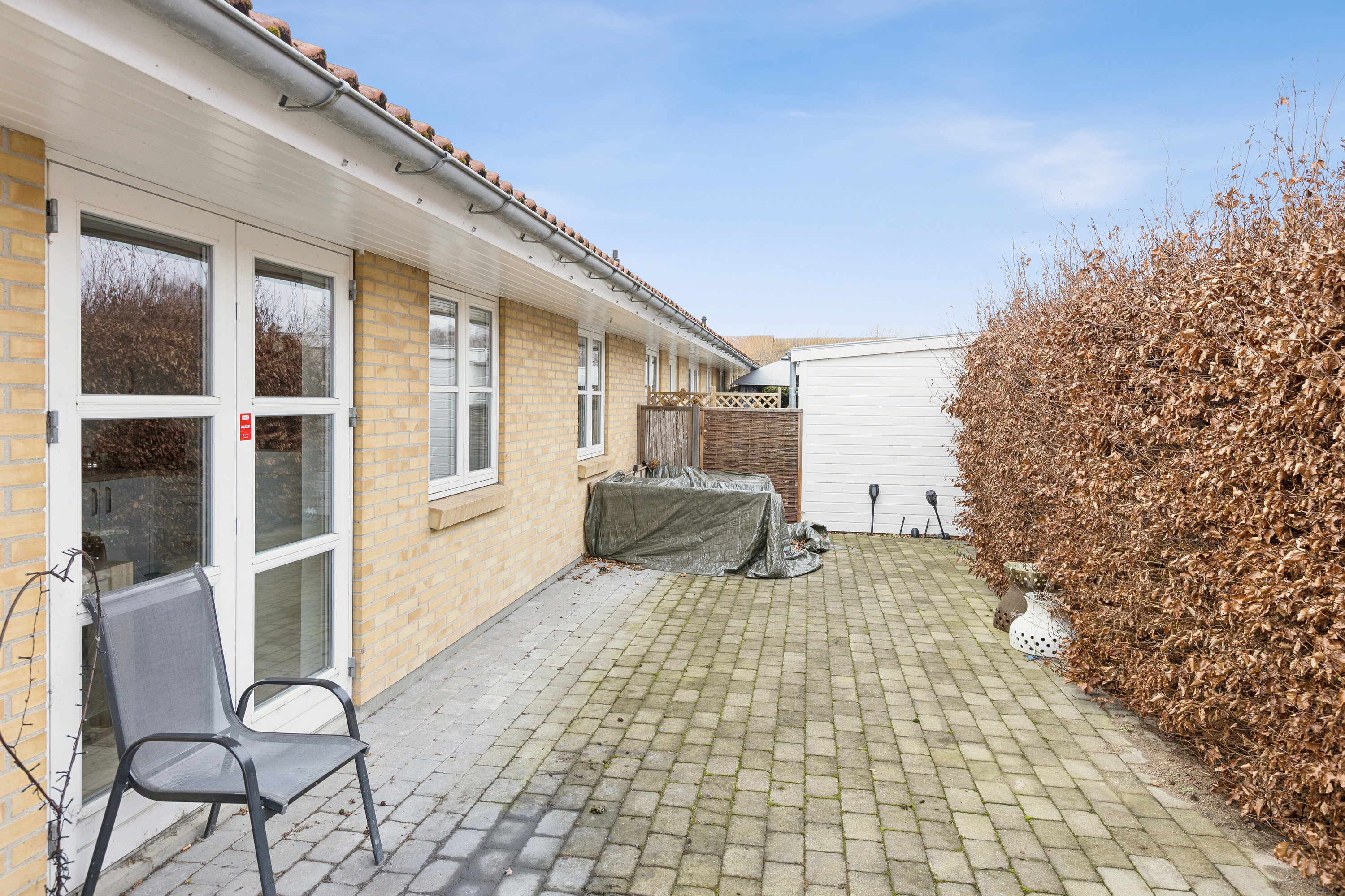 Fremhævet baghave billede i fuldskærmstilstand. Billede af Ole Rømers Vej 12, Haslev, 4690 Haslev