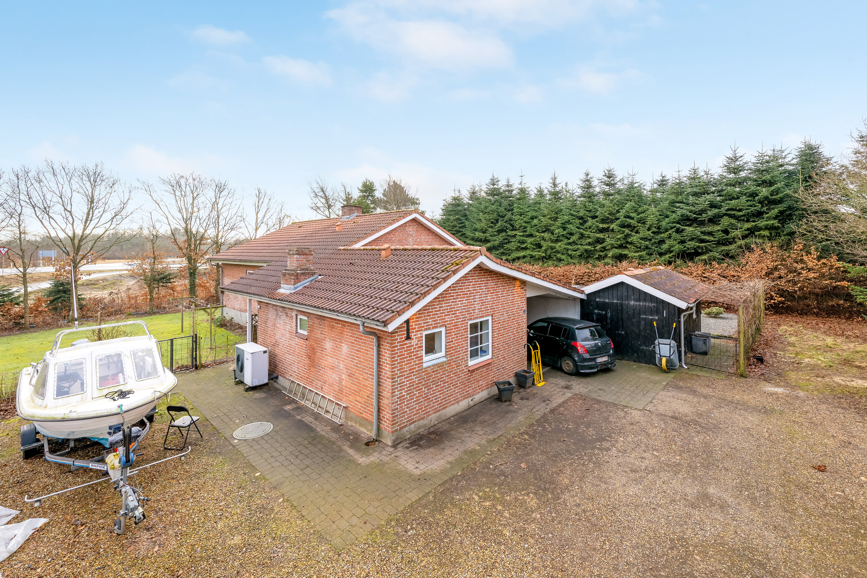 Fremhævet facade billede i fuldskærmstilstand. Billede af Blåkildevej 1, 6880 Tarm