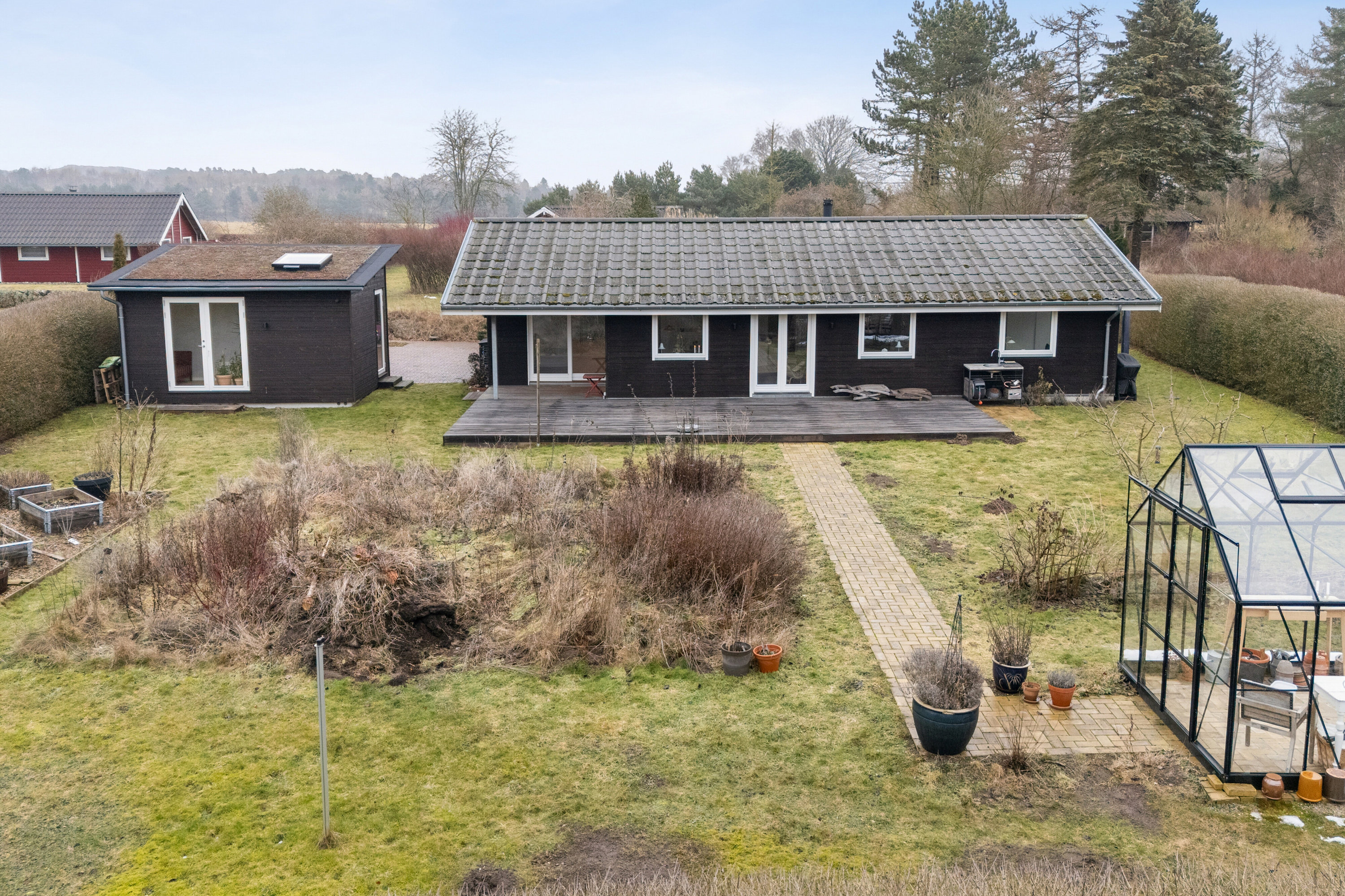 Fremhævet set fra haven billede i fuldskærmstilstand. Billede af Egelunden 28, Tollerup, 3370 Melby