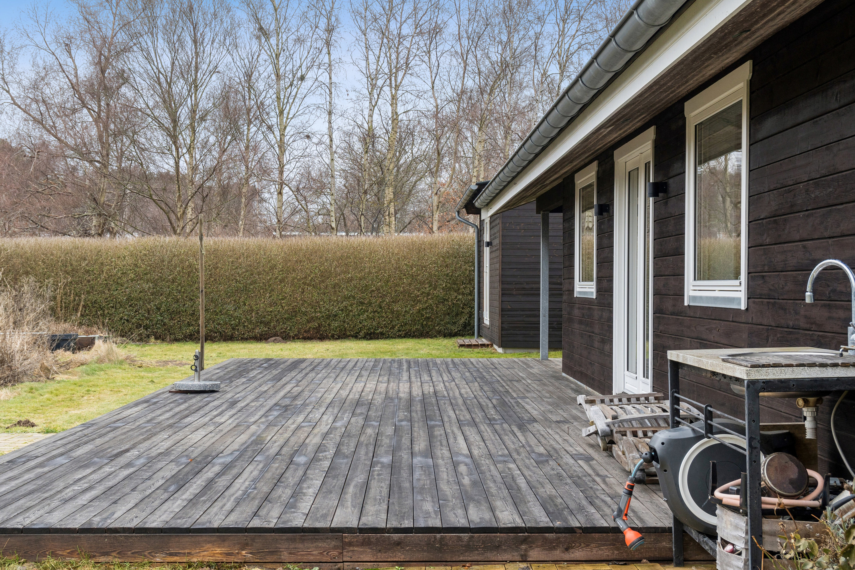 Fremhævet terrasse billede i fuldskærmstilstand. Billede af Egelunden 28, Tollerup, 3370 Melby