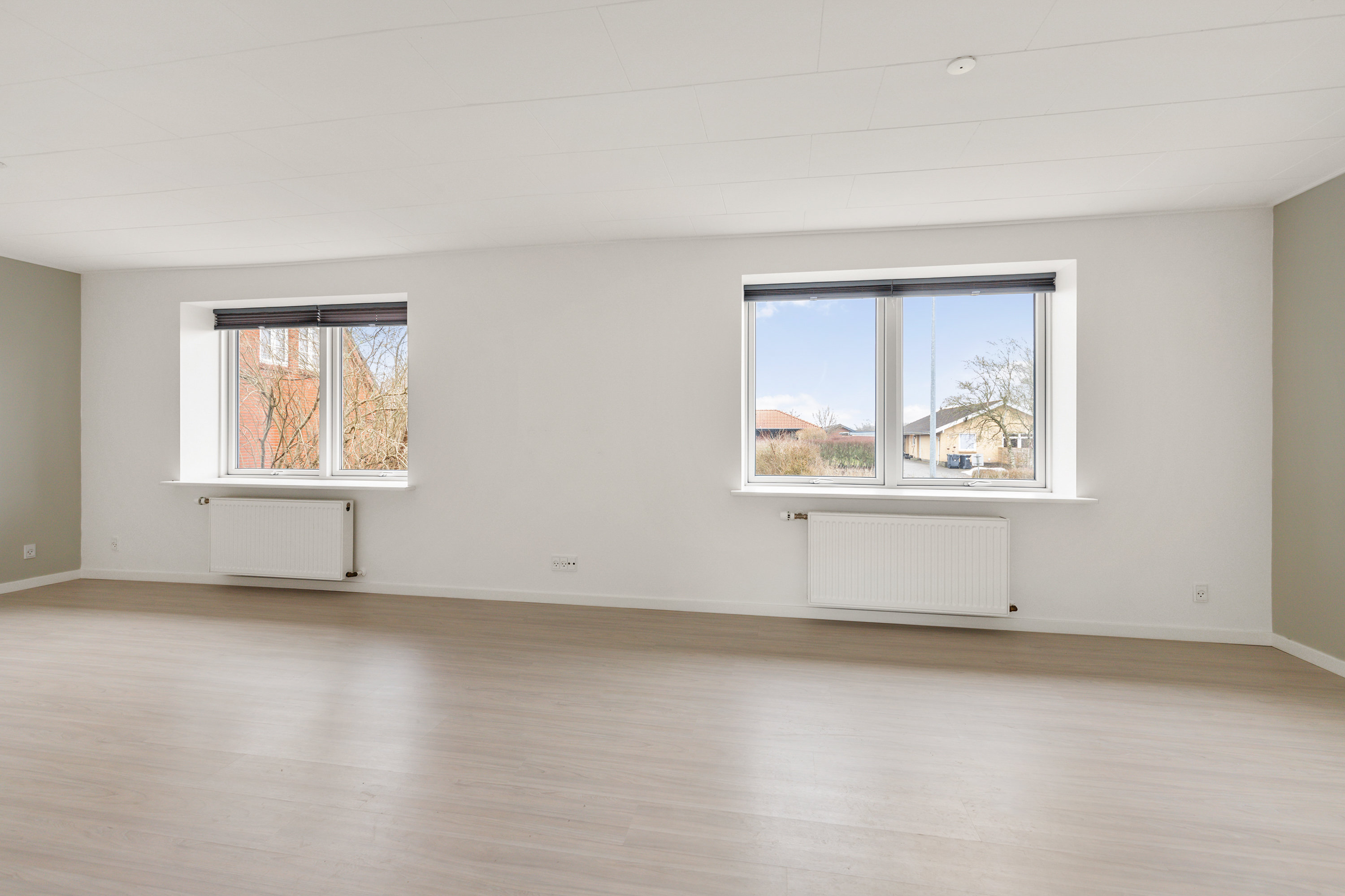 Fremhævet stue billede i fuldskærmstilstand. Billede af Skolevej 32, 9490 Pandrup