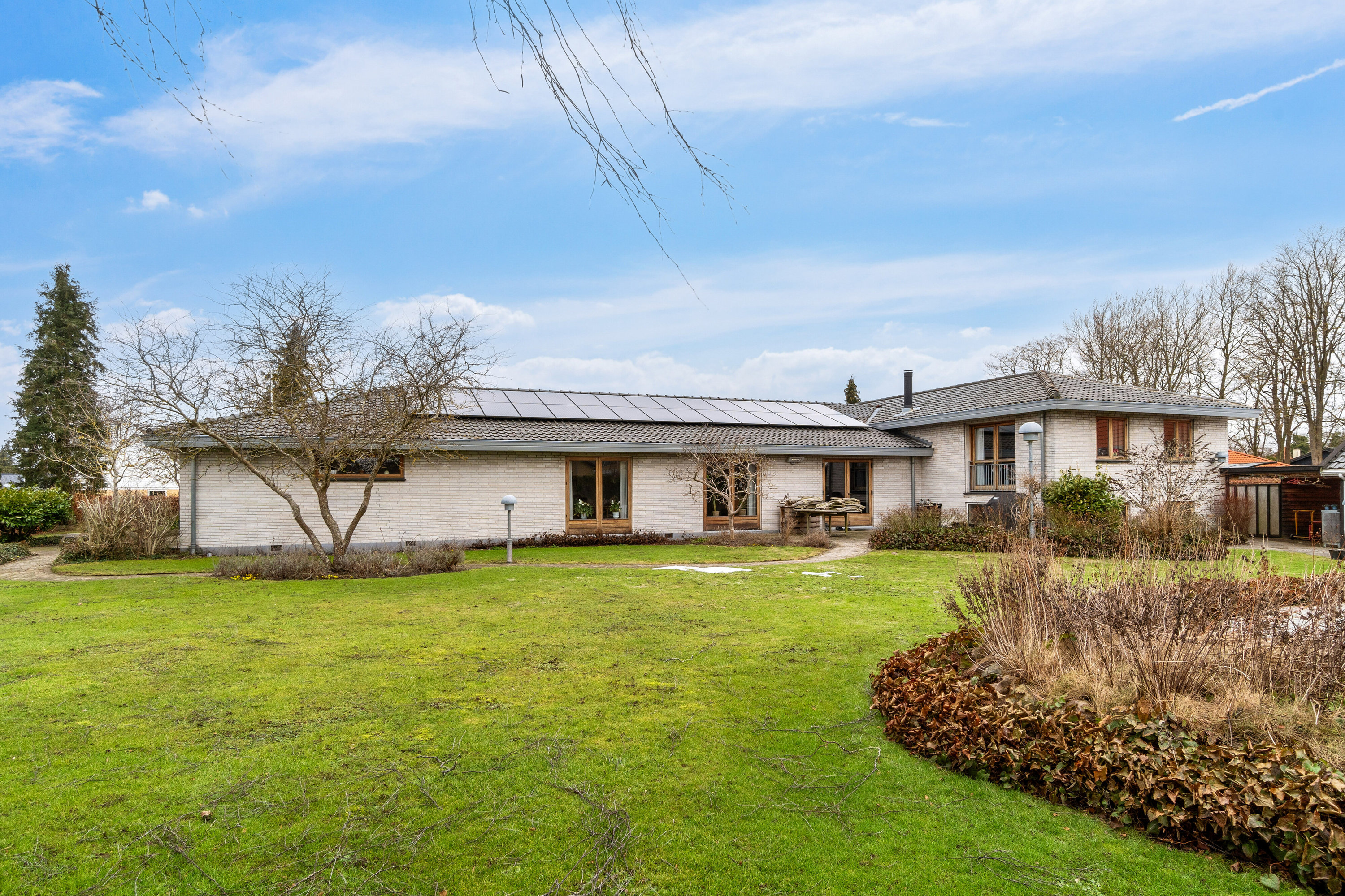 Fremhævet set fra haven billede i fuldskærmstilstand. Billede af Themstrupvej 17, 4690 Haslev