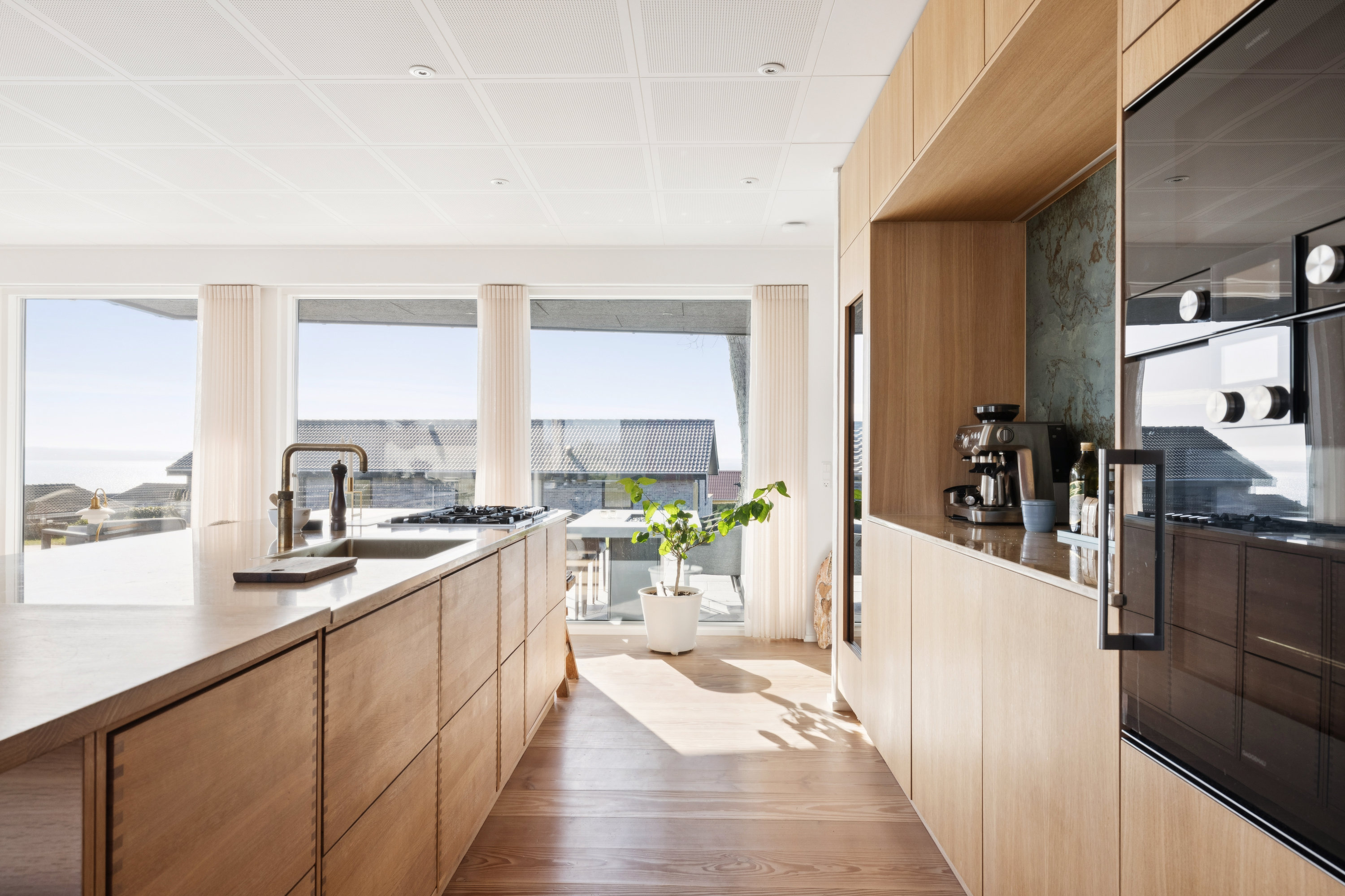 Fremhævet køkken billede i fuldskærmstilstand. Billede af Stenhøjvej 16, Følle Strand, 8410 Rønde