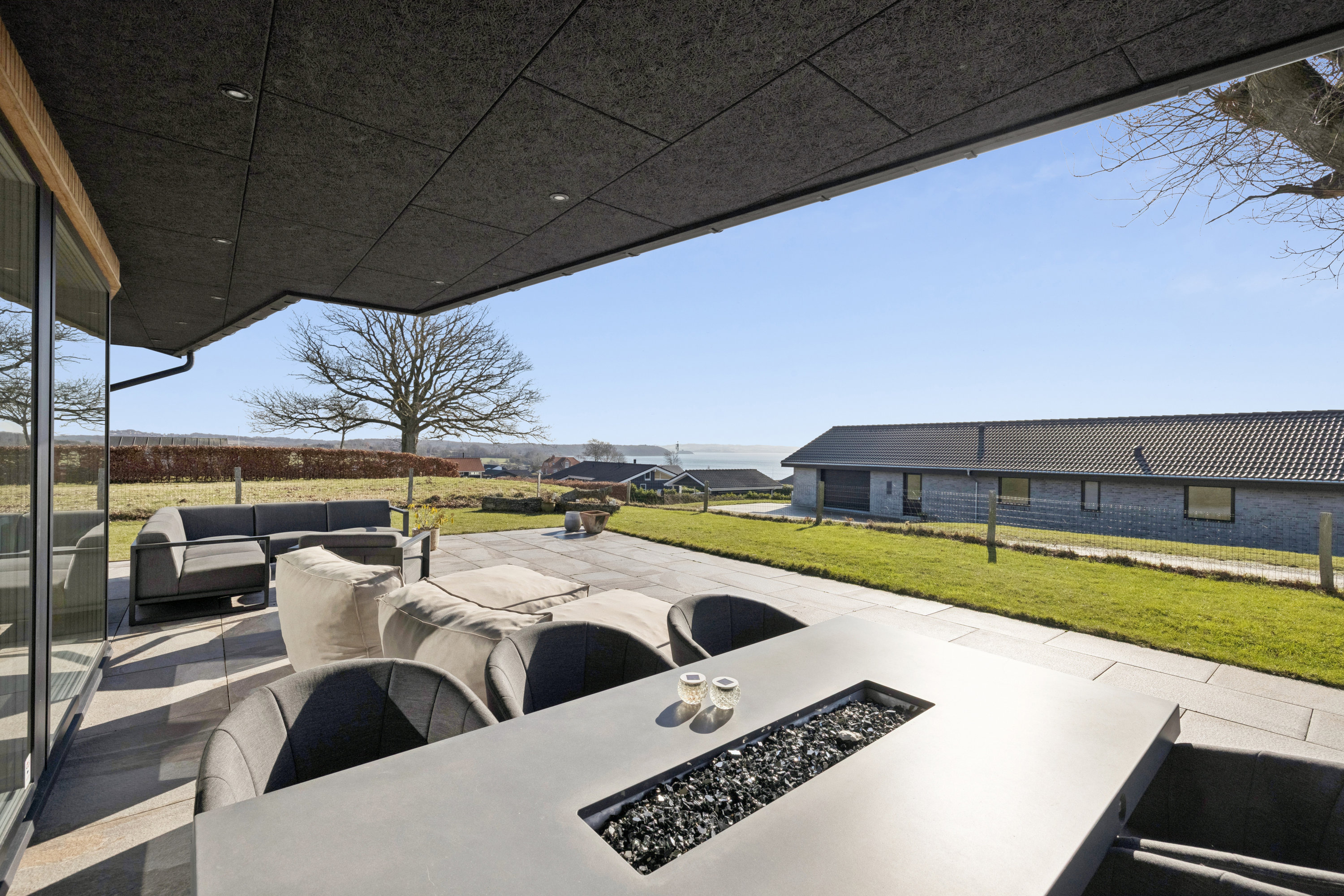 Fremhævet terrasse billede i fuldskærmstilstand. Billede af Stenhøjvej 16, Følle Strand, 8410 Rønde