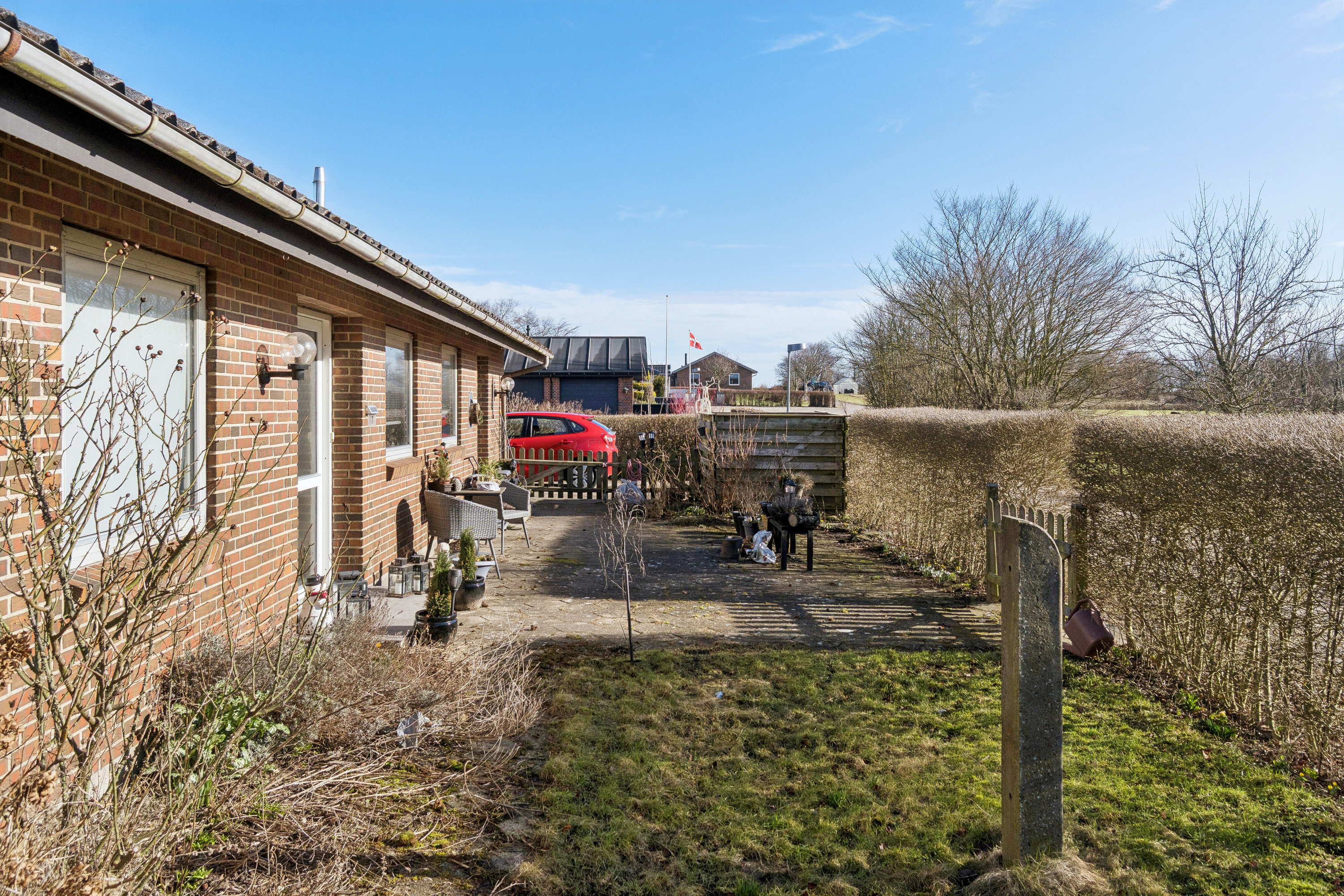 Fremhævet set fra haven billede i fuldskærmstilstand. Billede af Svinget 7, Koldby, 7752 Snedsted