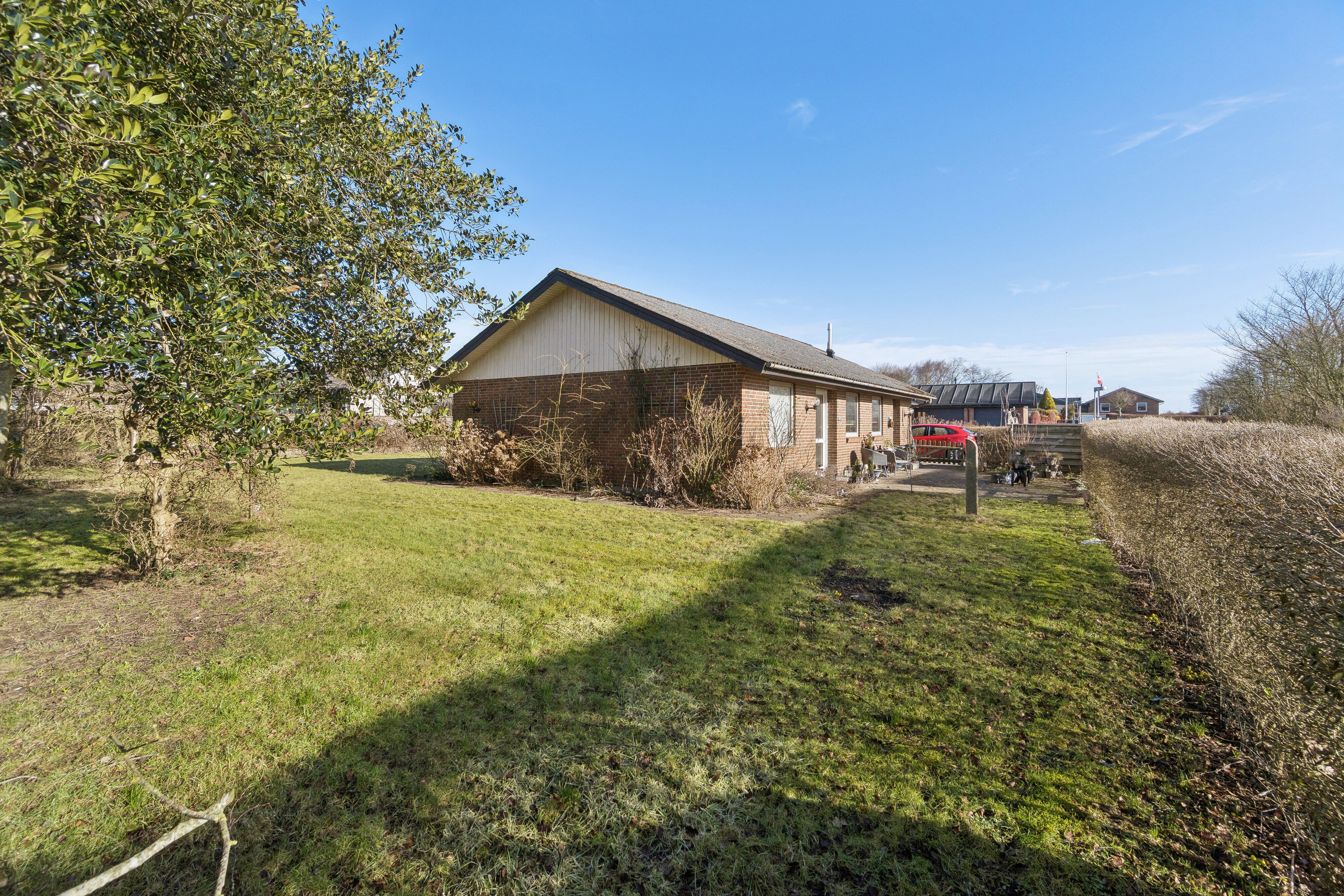 Fremhævet set fra haven billede i fuldskærmstilstand. Billede af Svinget 7, Koldby, 7752 Snedsted