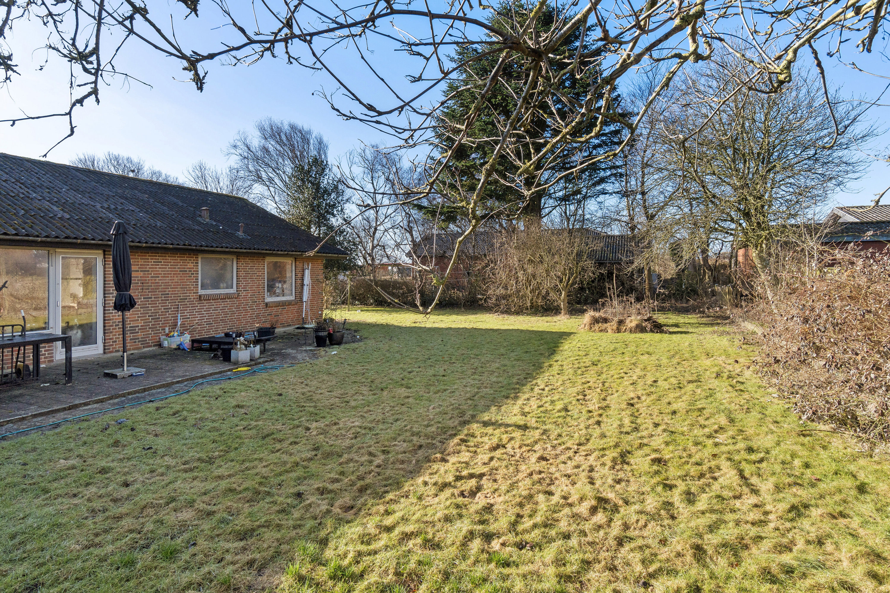 Fremhævet set fra haven billede i fuldskærmstilstand. Billede af Svinget 7, Koldby, 7752 Snedsted