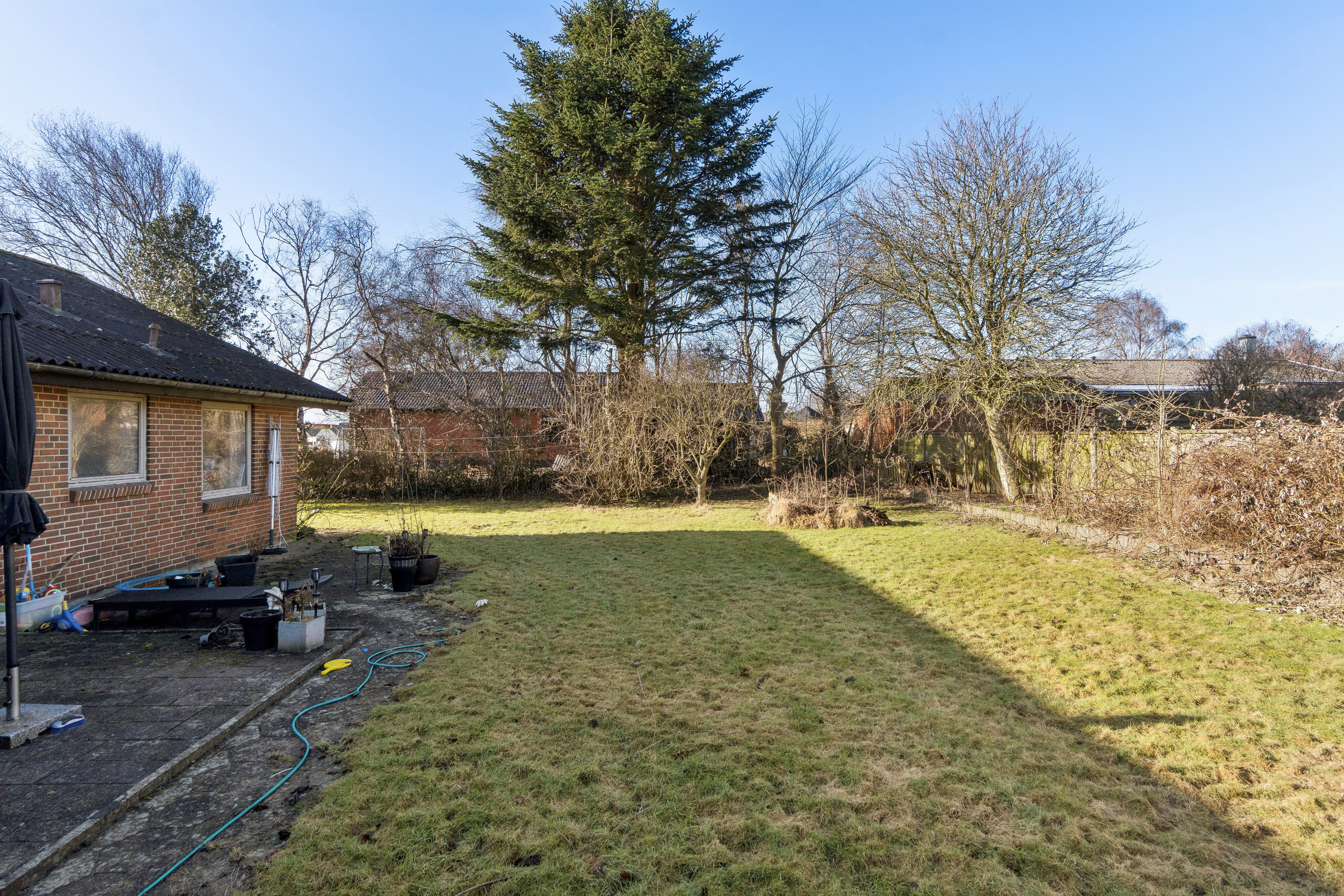 Fremhævet set fra haven billede i fuldskærmstilstand. Billede af Svinget 7, Koldby, 7752 Snedsted