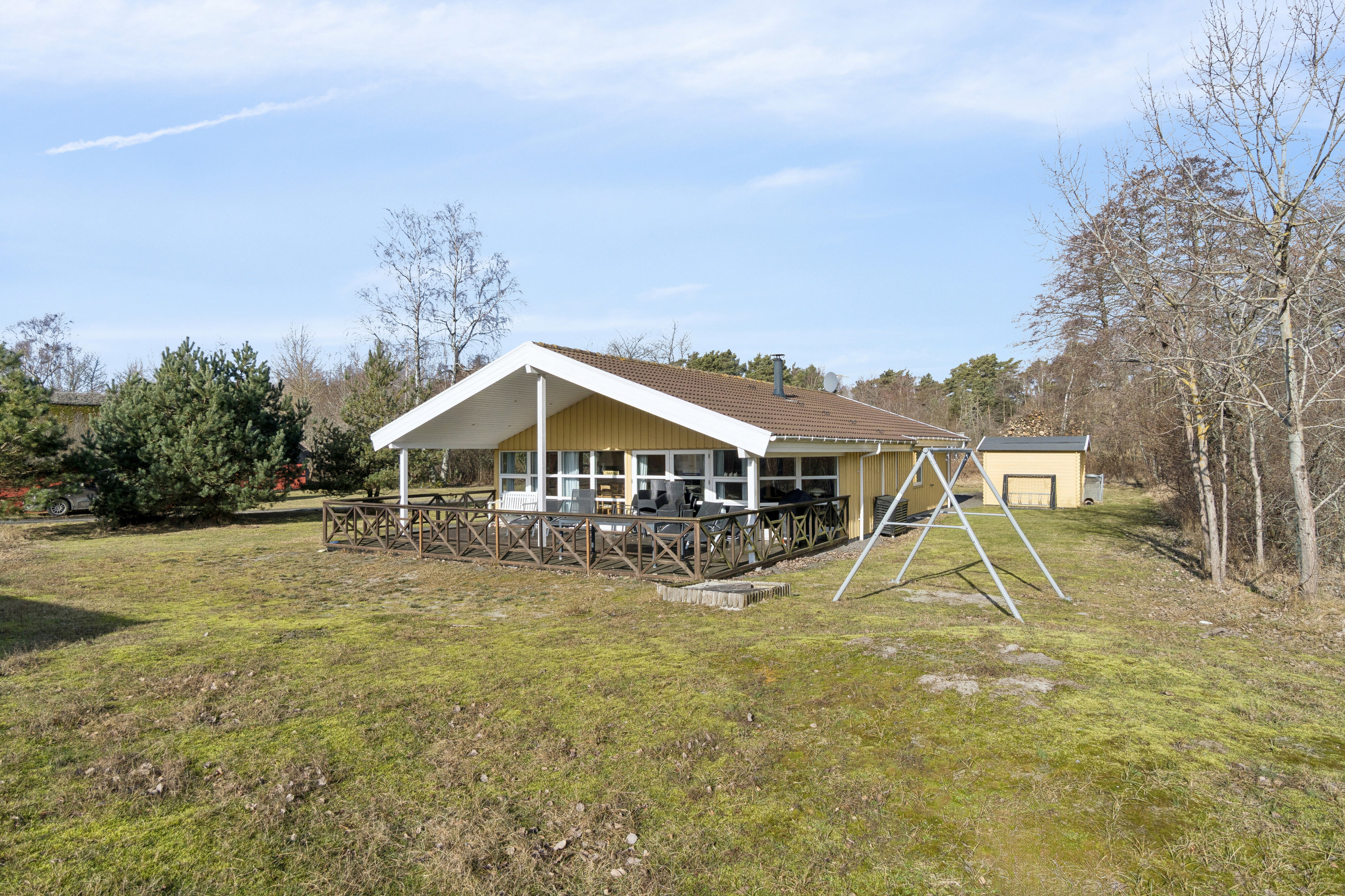 Fremhævet set fra haven billede i fuldskærmstilstand. Billede af Sjøstauan 5A, Pedersker, 3720 Aakirkeby