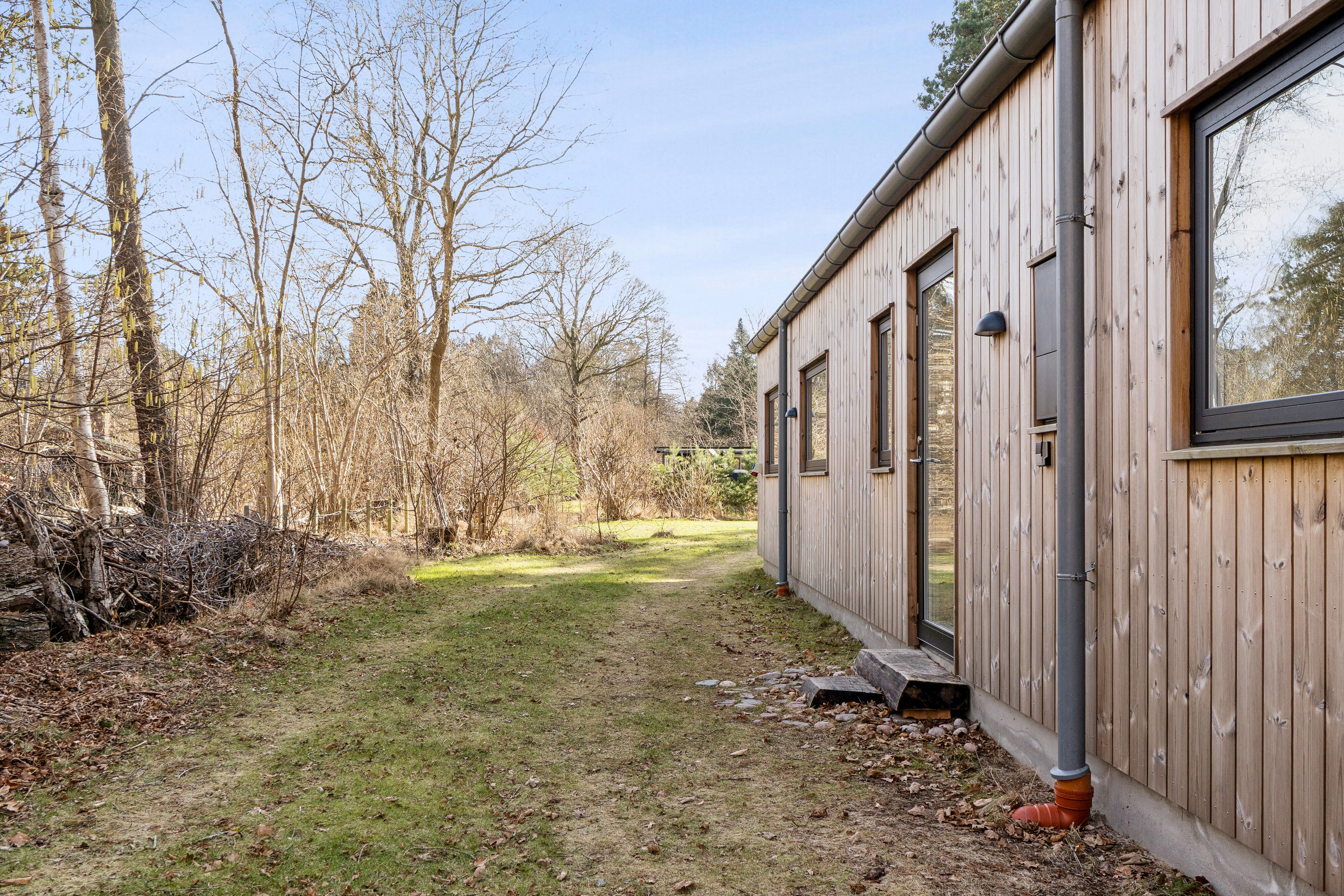 Fremhævet udendørs billede i fuldskærmstilstand. Billede af Hjertegræsvej 26, Asserbo, 3300 Frederiksværk