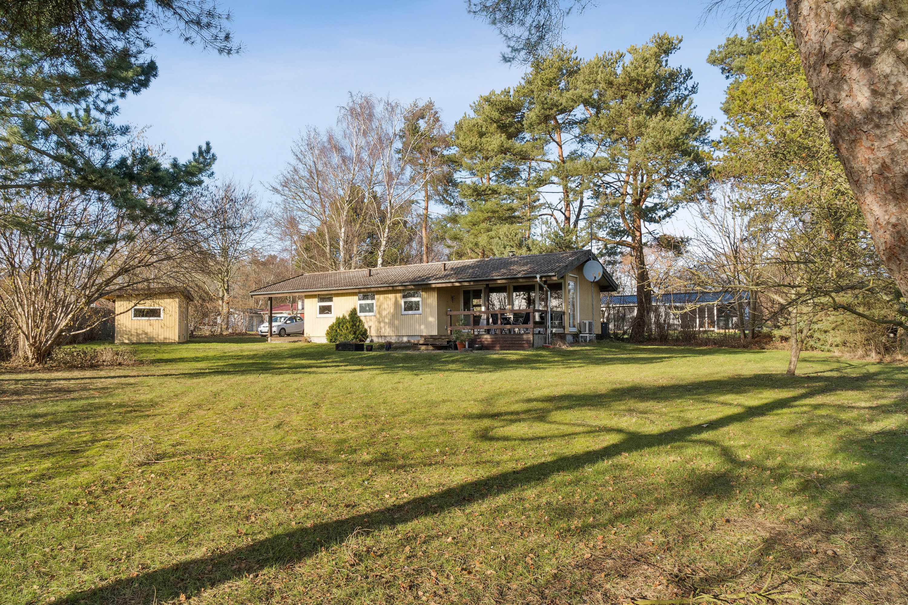 Fremhævet set fra haven billede i fuldskærmstilstand. Billede af Mathilde Nielsensvej 8, Evetofte, 3370 Melby