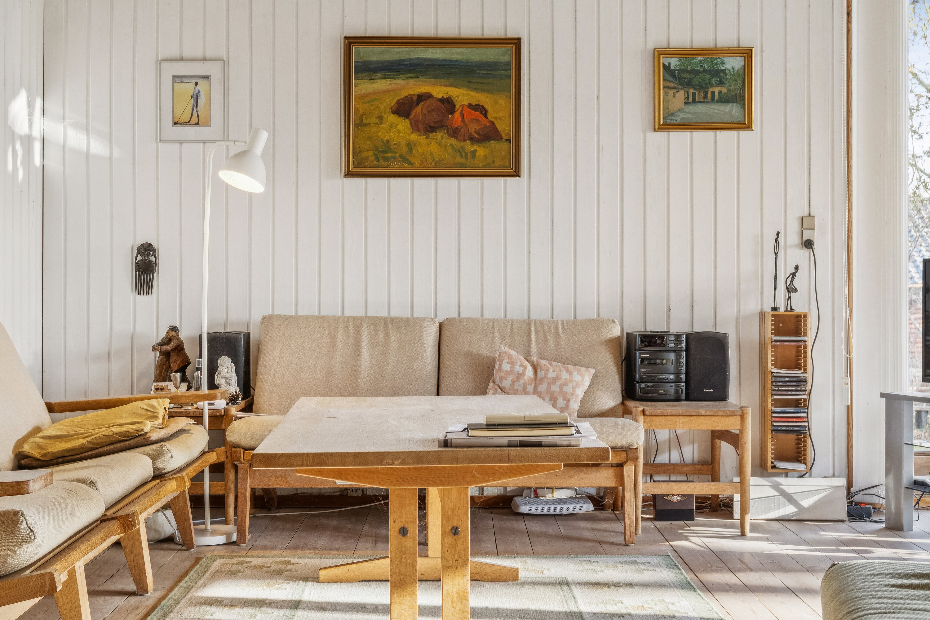 Fremhævet stue billede i fuldskærmstilstand. Billede af Mathilde Nielsensvej 8, Evetofte, 3370 Melby