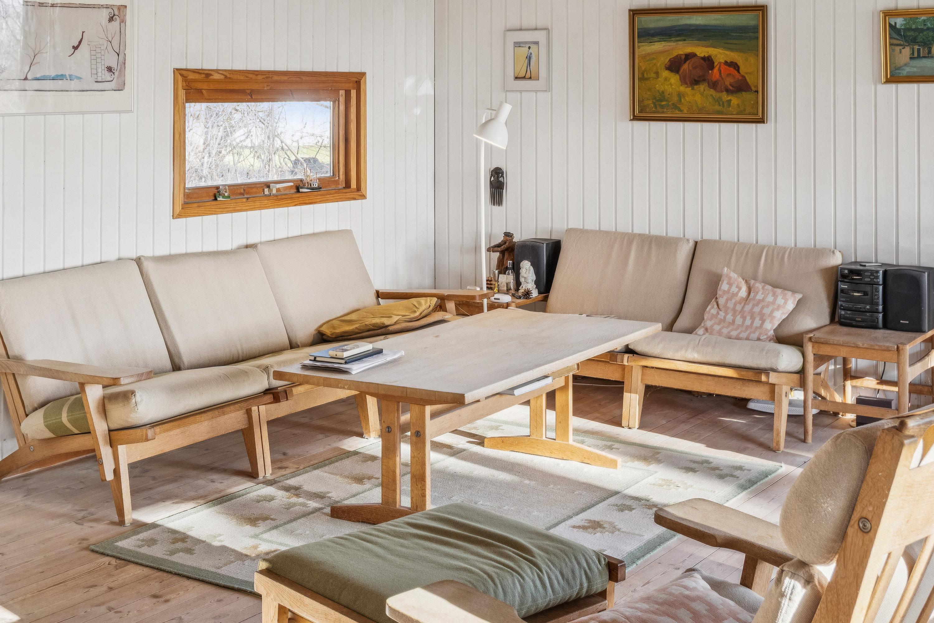 Fremhævet stue billede i fuldskærmstilstand. Billede af Mathilde Nielsensvej 8, Evetofte, 3370 Melby