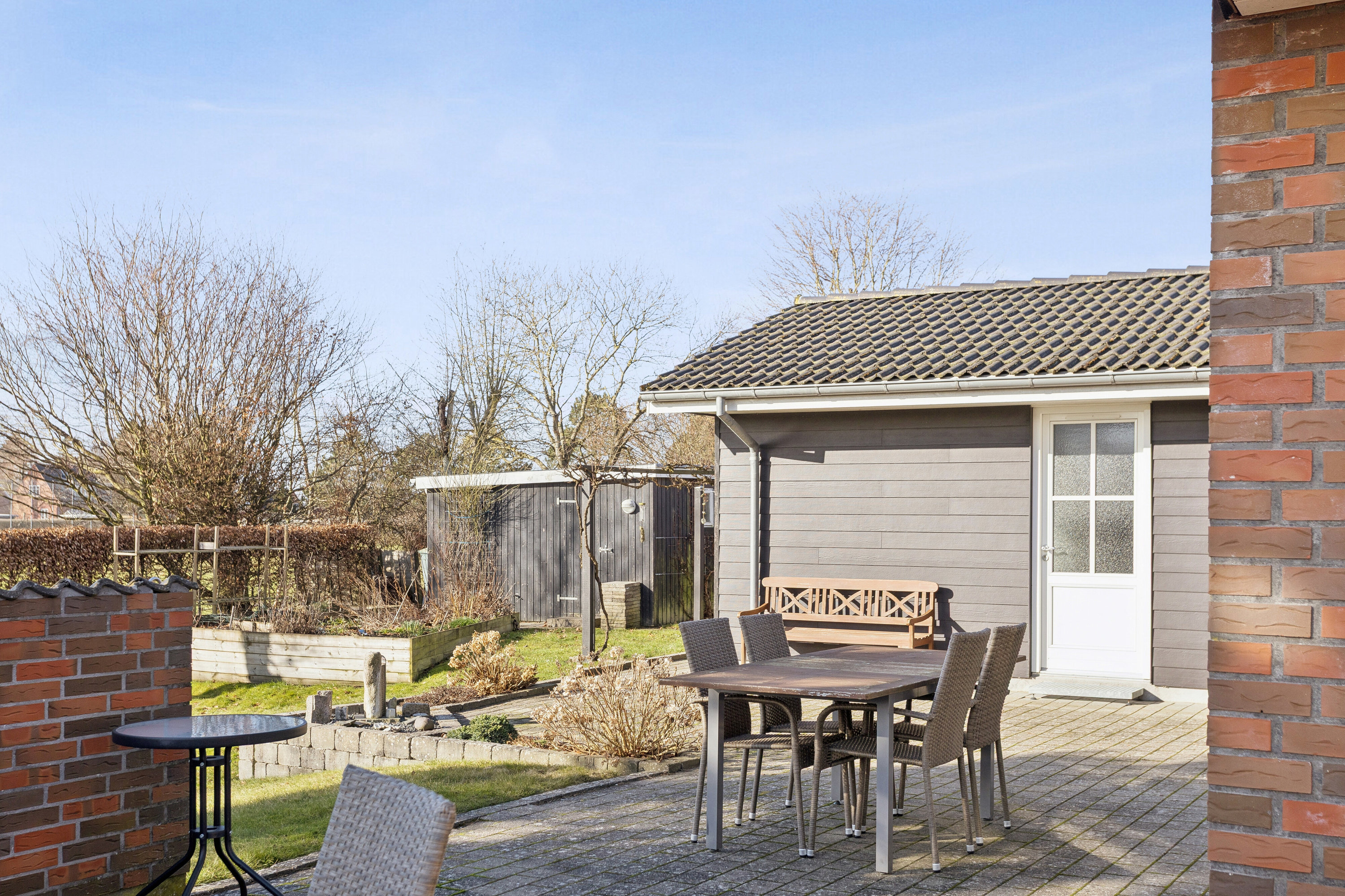 Fremhævet set fra haven billede i fuldskærmstilstand. Billede af Muskatvænget 9, 5772 Kværndrup