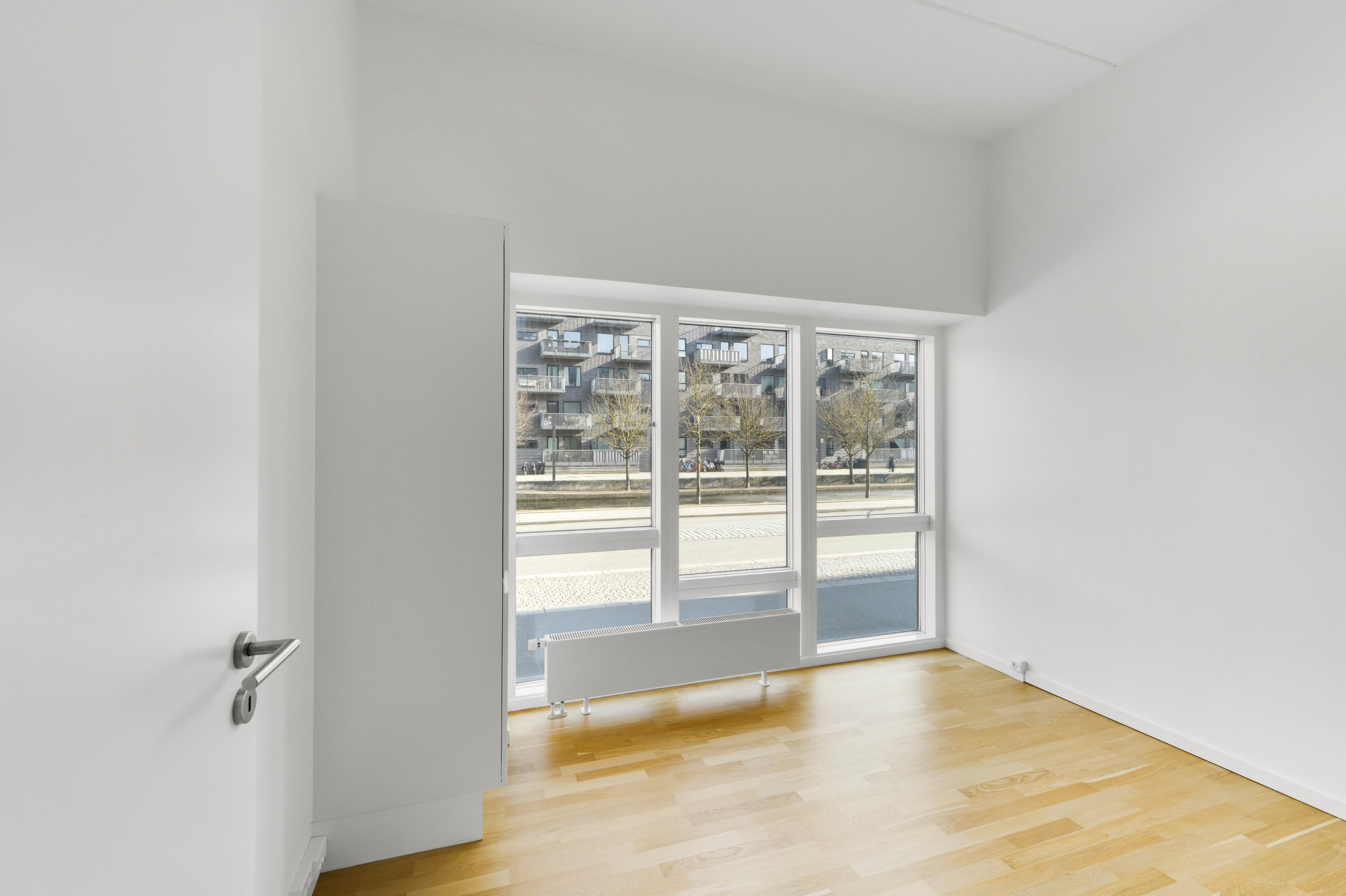 Fremhævet stue billede i fuldskærmstilstand. Billede af Robert Jacobsens Vej 38A, st.. th., 2300 København S