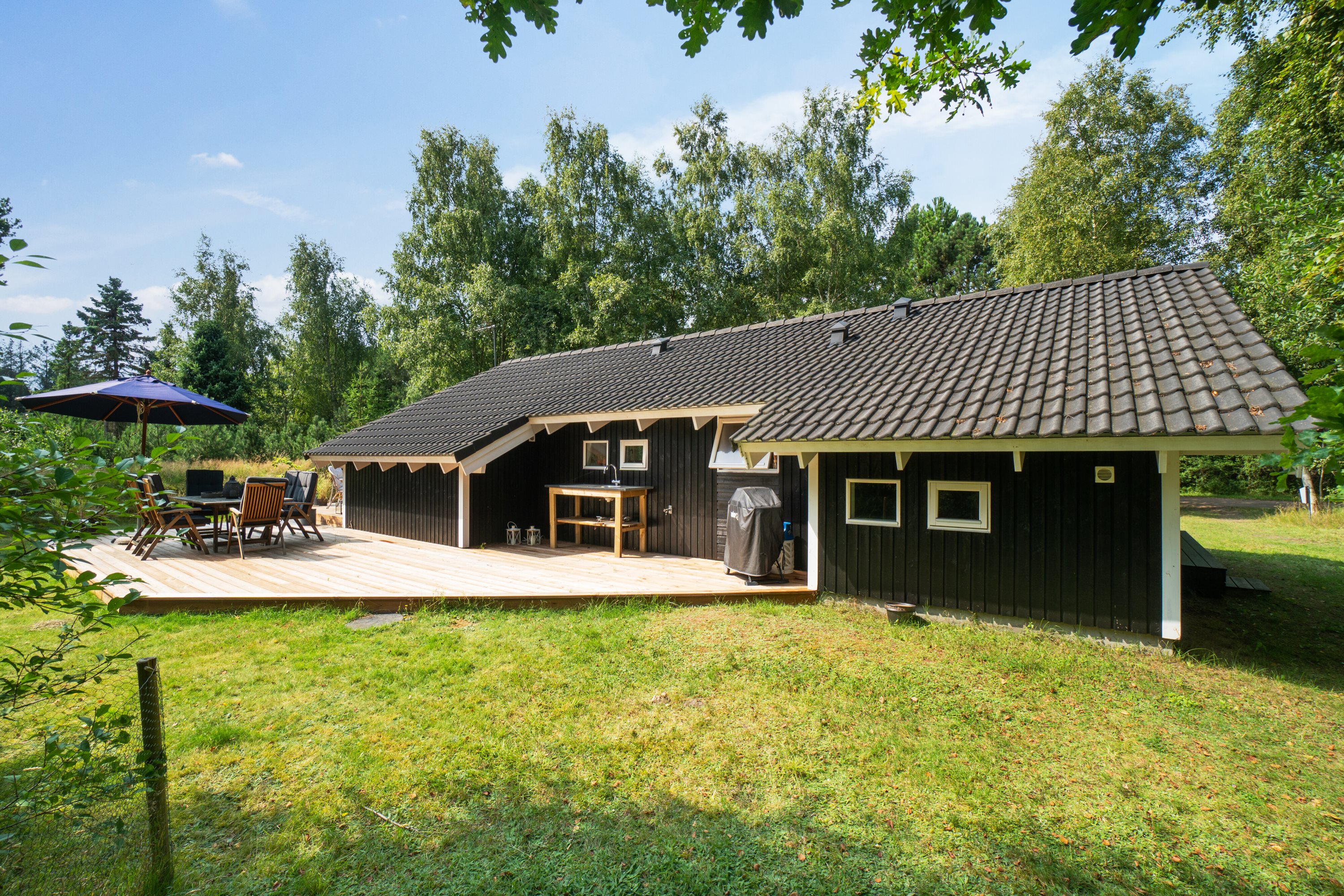 Fremhævet set fra haven billede i fuldskærmstilstand. Billede af Koglevænget 12, Stenstrup, 4573 Højby