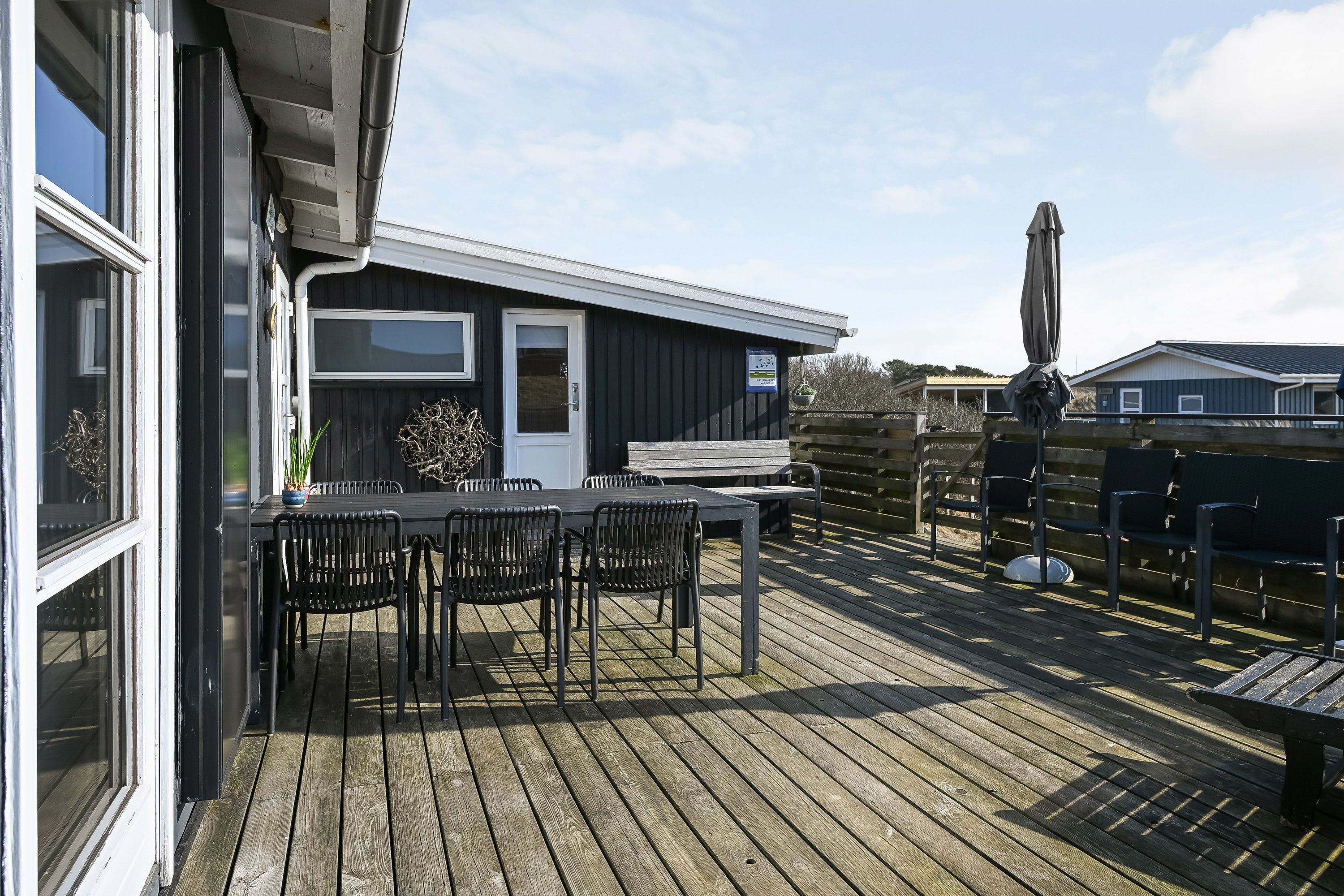 Fremhævet terrasse billede i fuldskærmstilstand. Billede af Slunden 54, Rindby Strand, 6720 Fanø