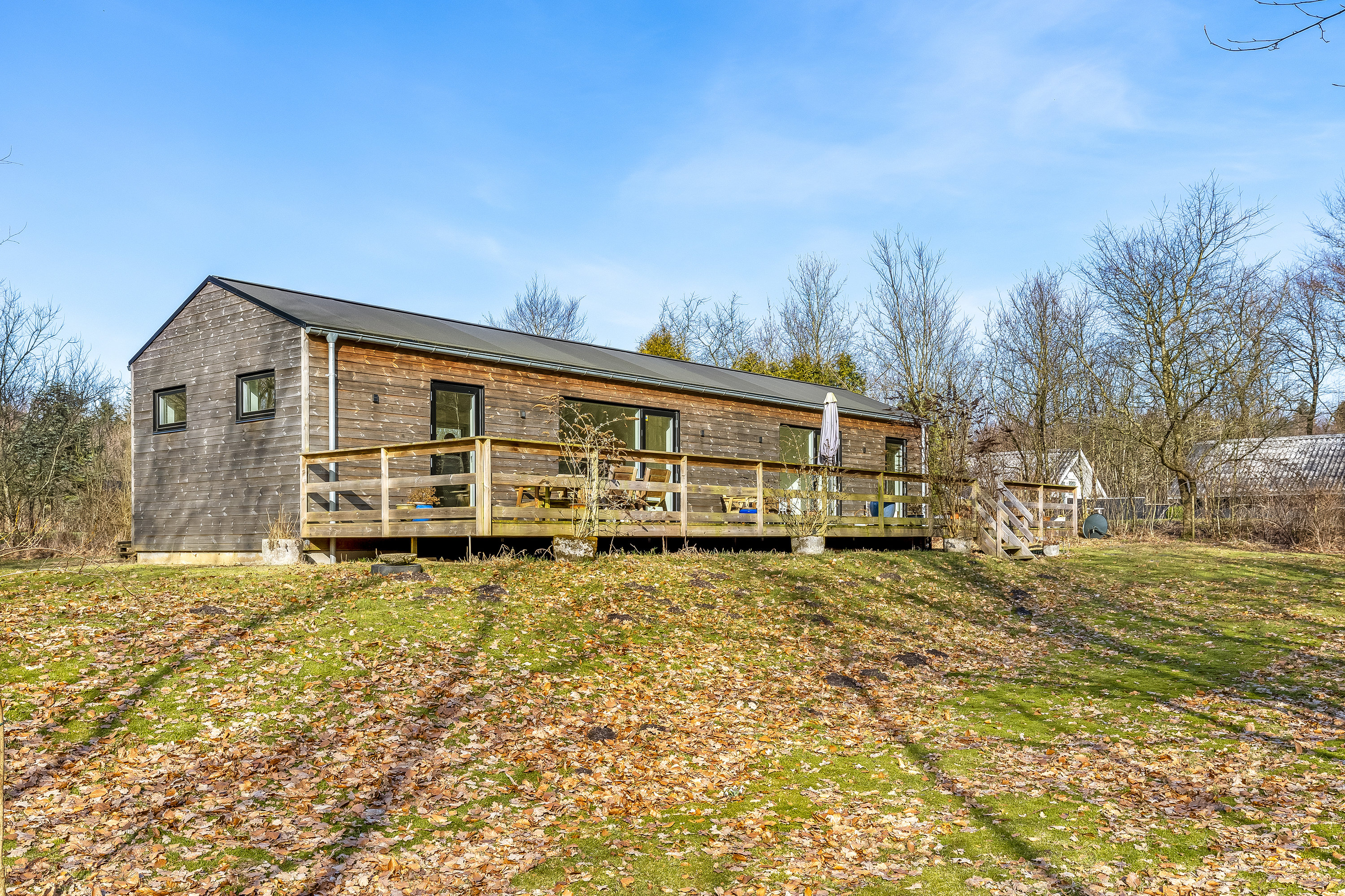 Fremhævet facade billede i fuldskærmstilstand. Billede af Pionerskoven 10, Arrild, 6520 Toftlund