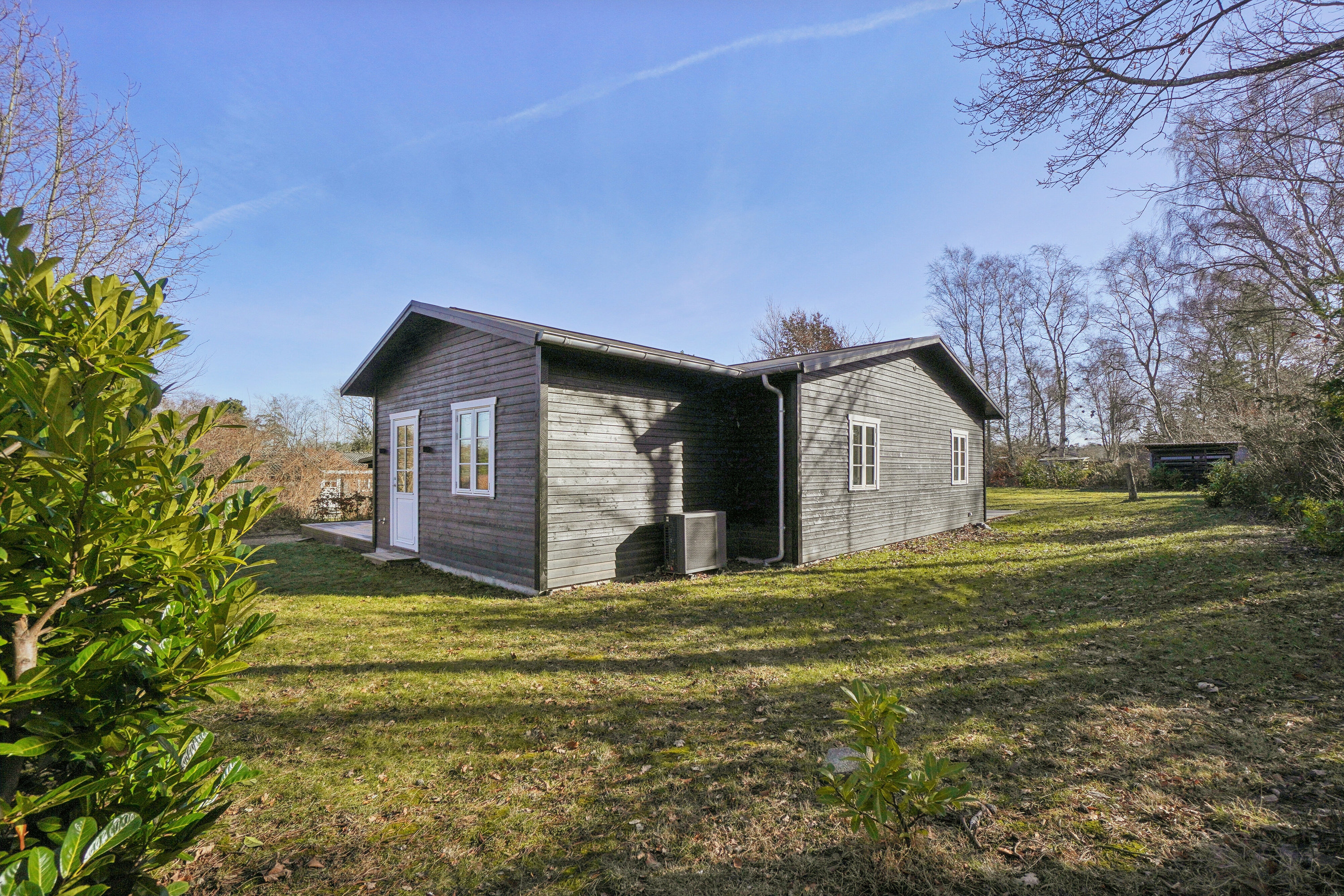 Fremhævet set fra haven billede i fuldskærmstilstand. Billede af Hans Kurtsvej 24, Evetofte, 3370 Melby