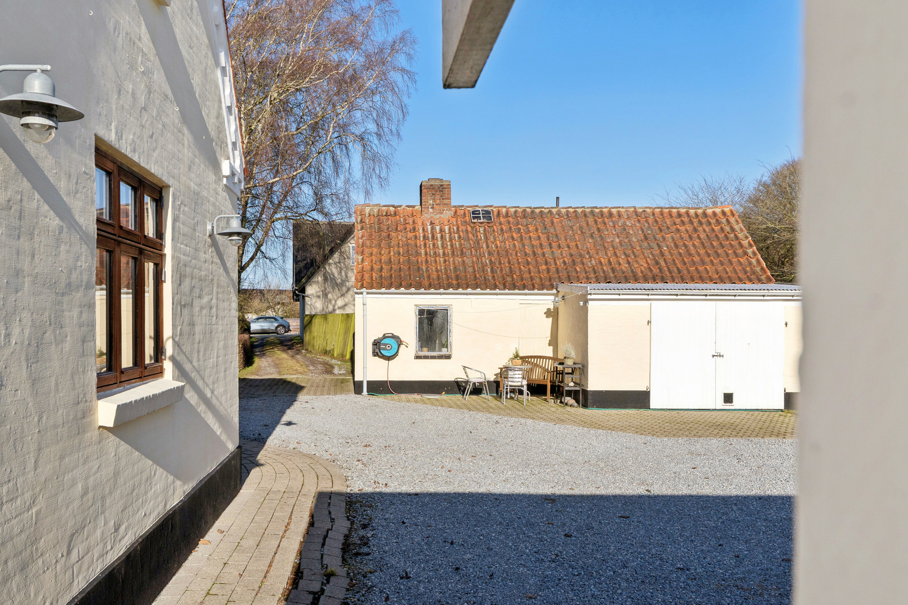 Fremhævet set fra haven billede i fuldskærmstilstand. Billede af Ilbro Byvej 108, 9800 Hjørring