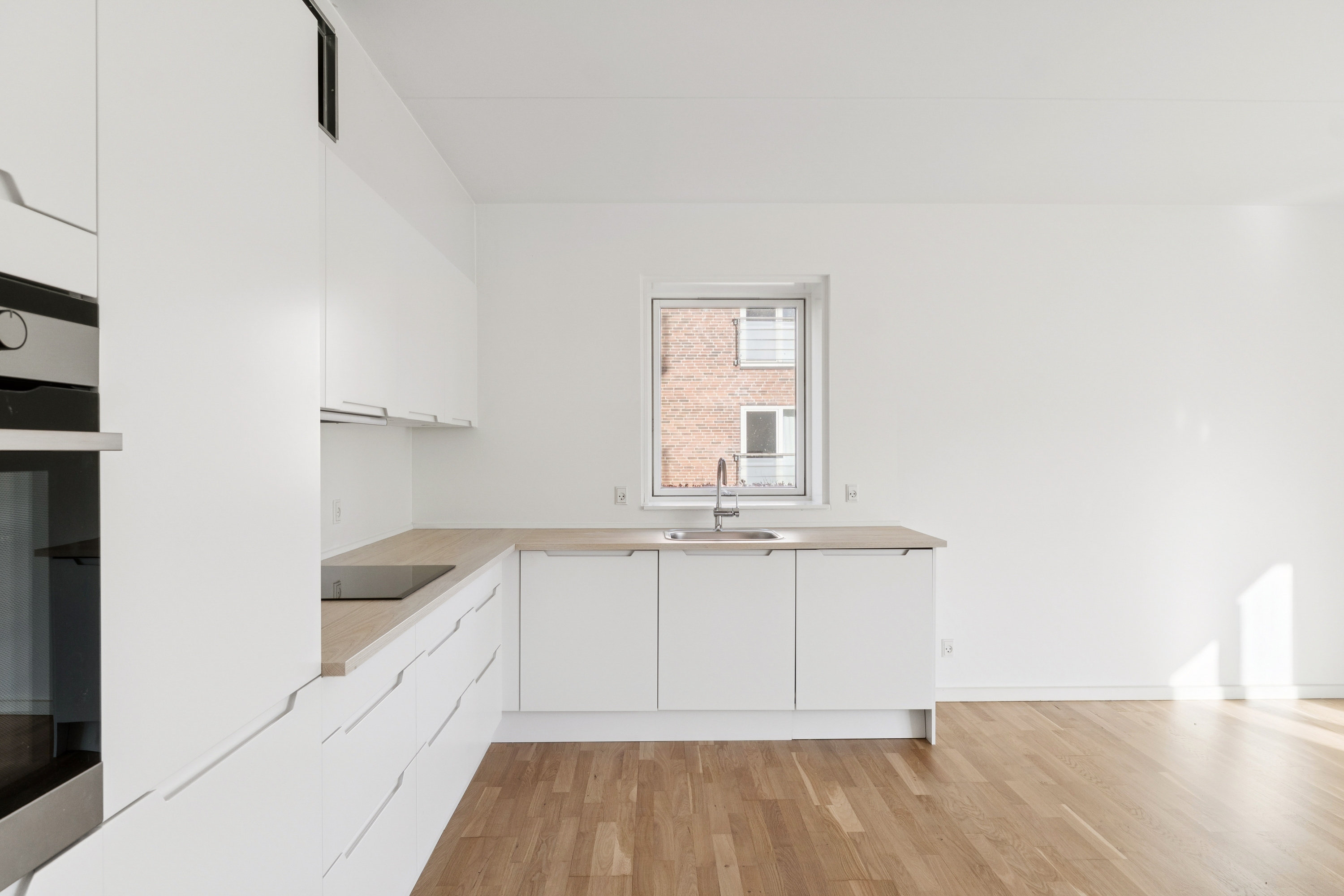 Fremhævet køkken billede i fuldskærmstilstand. Billede af Venøgade 24, st.. mf., 2100 København Ø