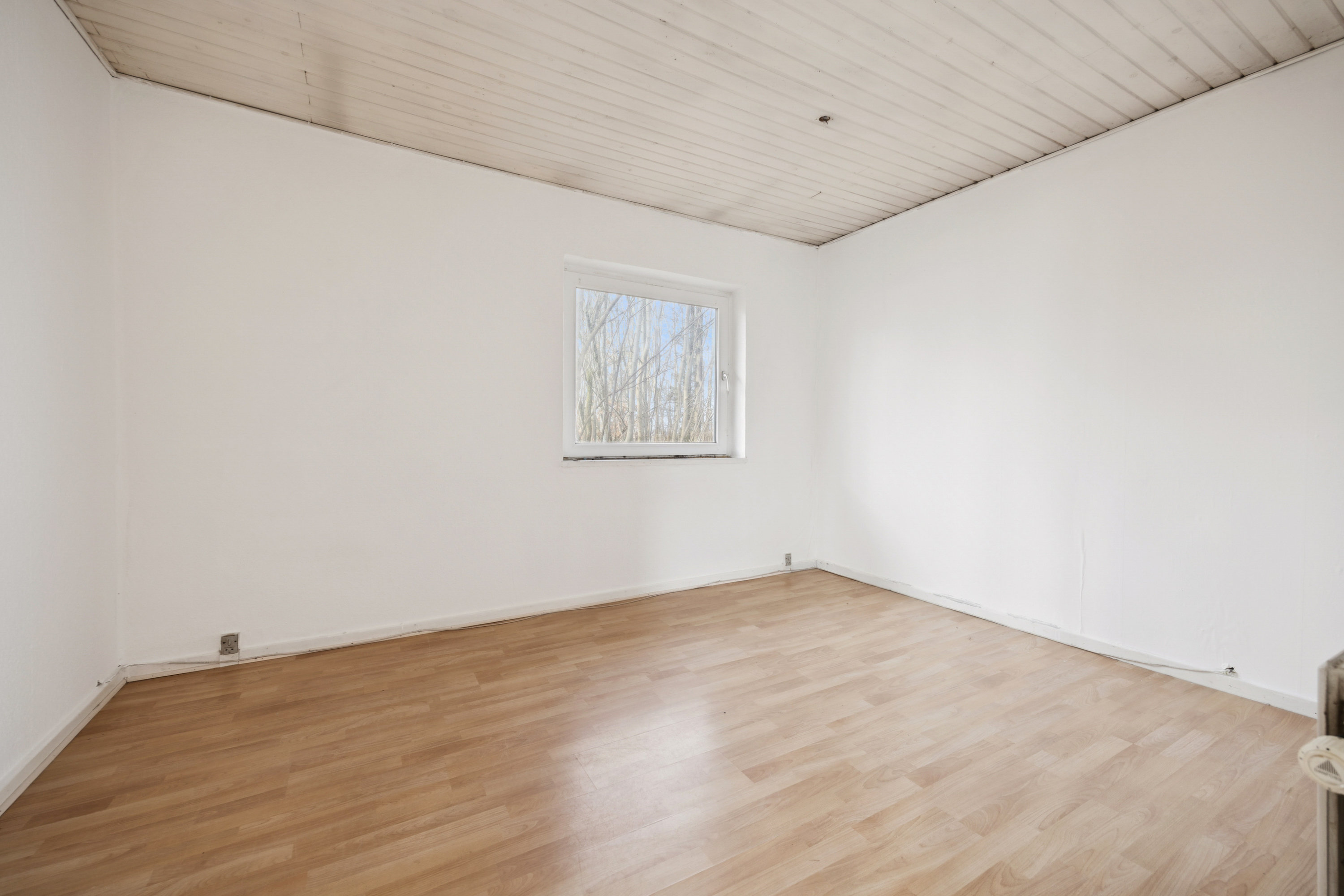 Fremhævet stue billede i fuldskærmstilstand. Billede af Vestergade 92, 9320 Hjallerup