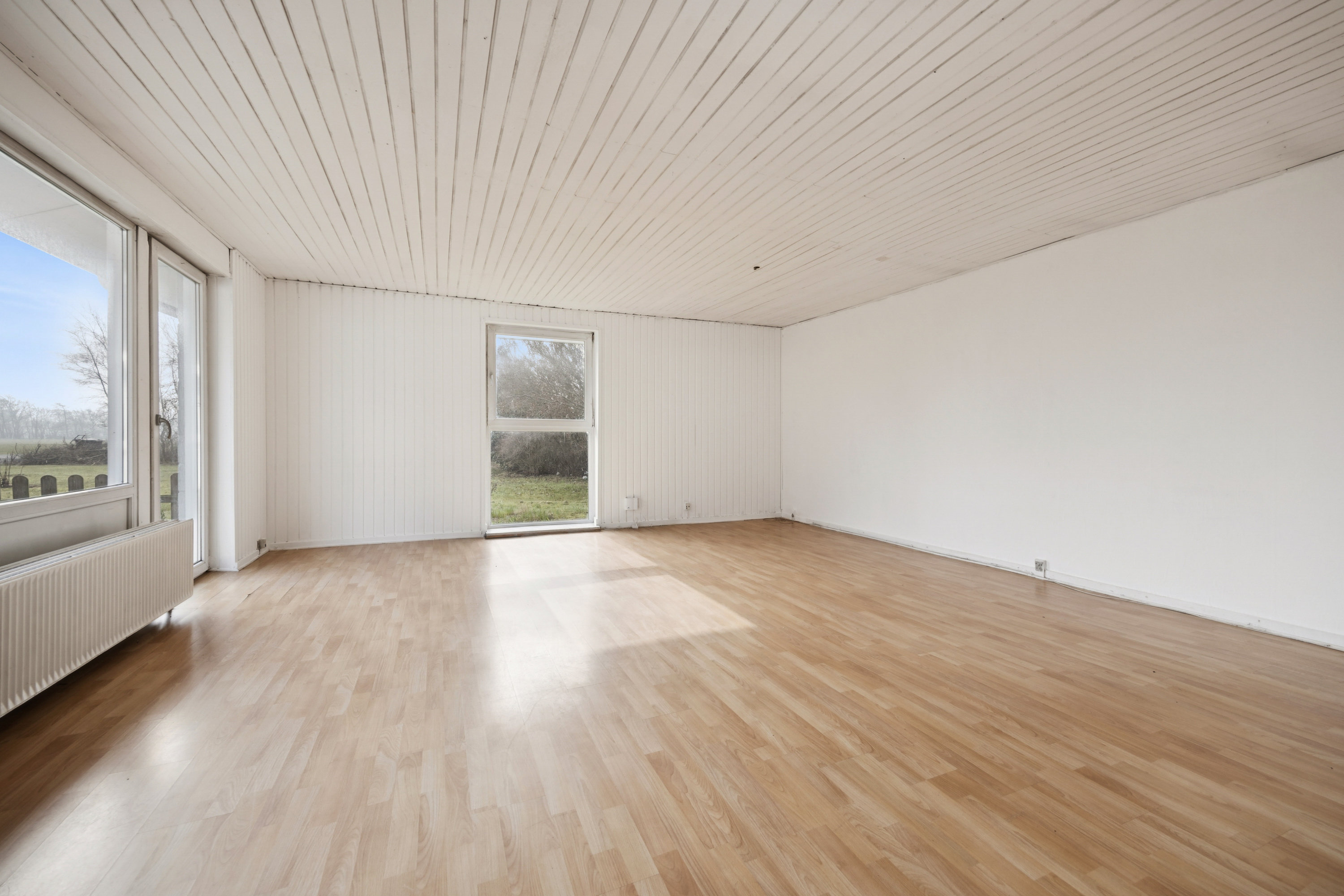 Fremhævet stue billede i fuldskærmstilstand. Billede af Vestergade 92, 9320 Hjallerup