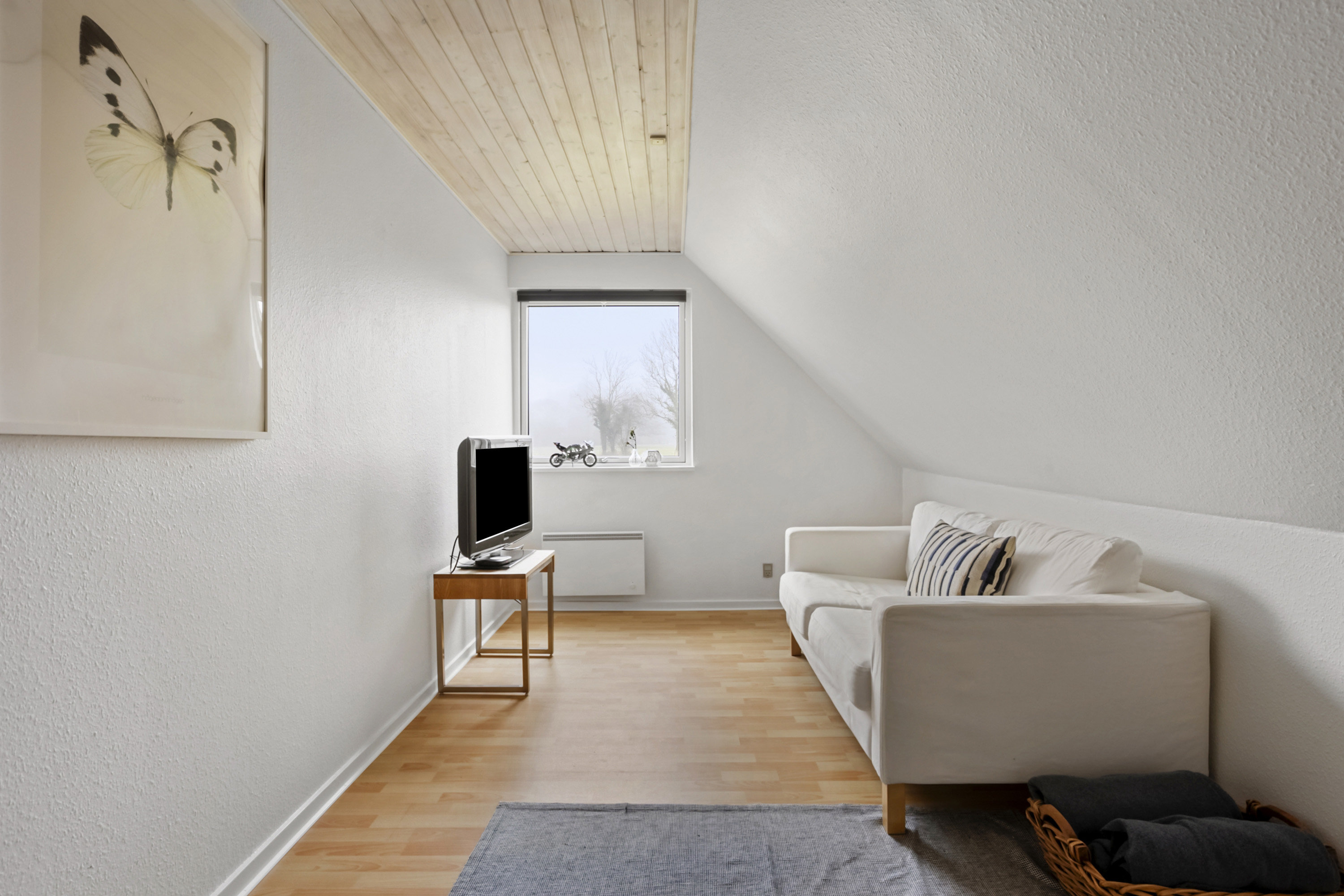 Fremhævet stue billede i fuldskærmstilstand. Billede af Lundsbjerg Møllevej 35, Begyndt, 6200 Aabenraa