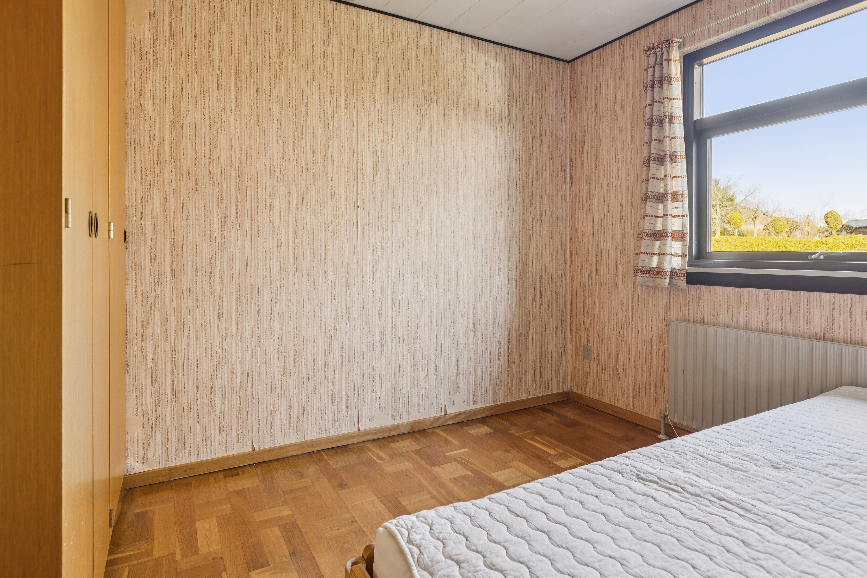 Fremhævet soveværelse billede i fuldskærmstilstand. Billede af Lupinvej 39, 4773 Stensved