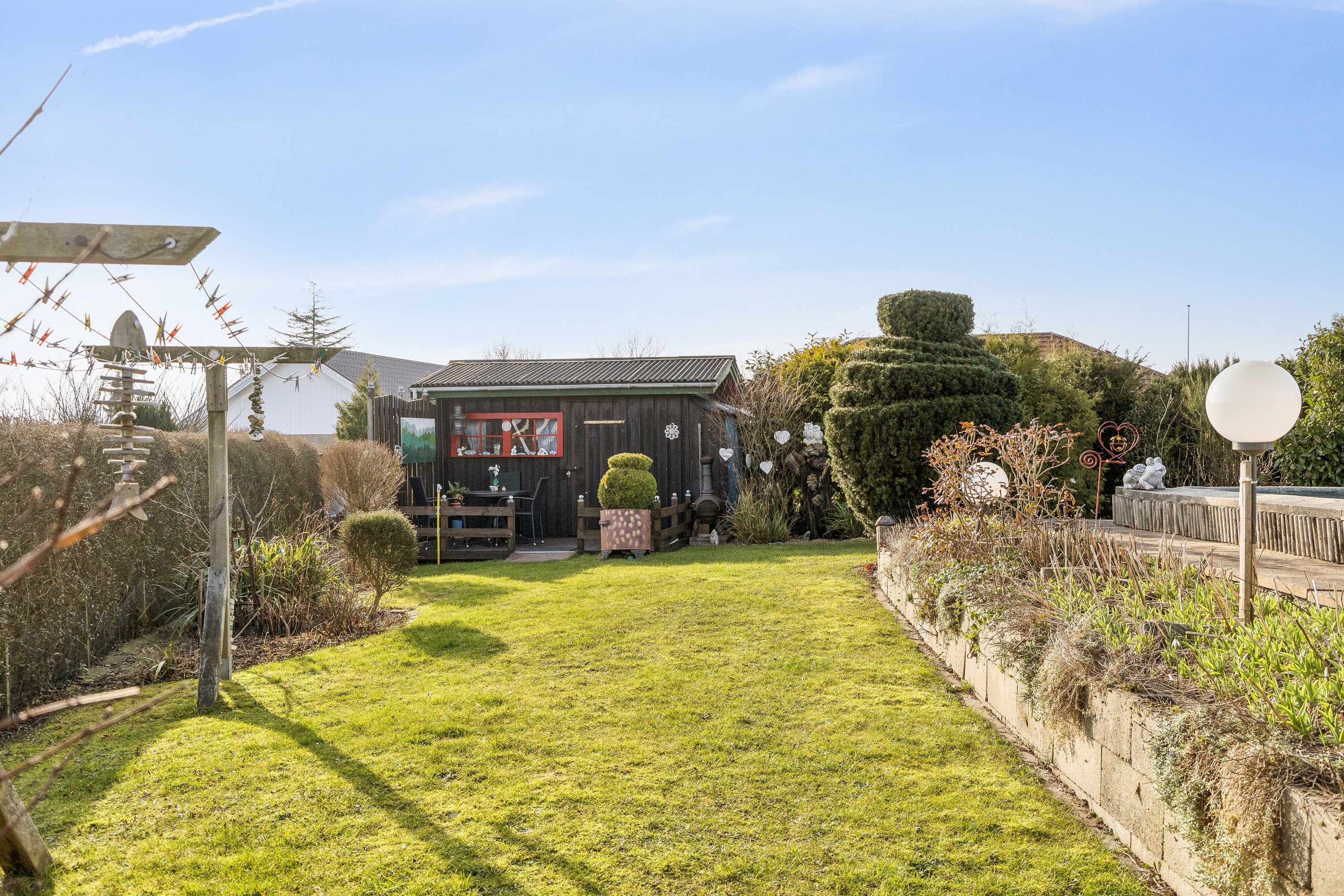 Fremhævet set fra haven billede i fuldskærmstilstand. Billede af Skovglimt 31, 6340 Kruså