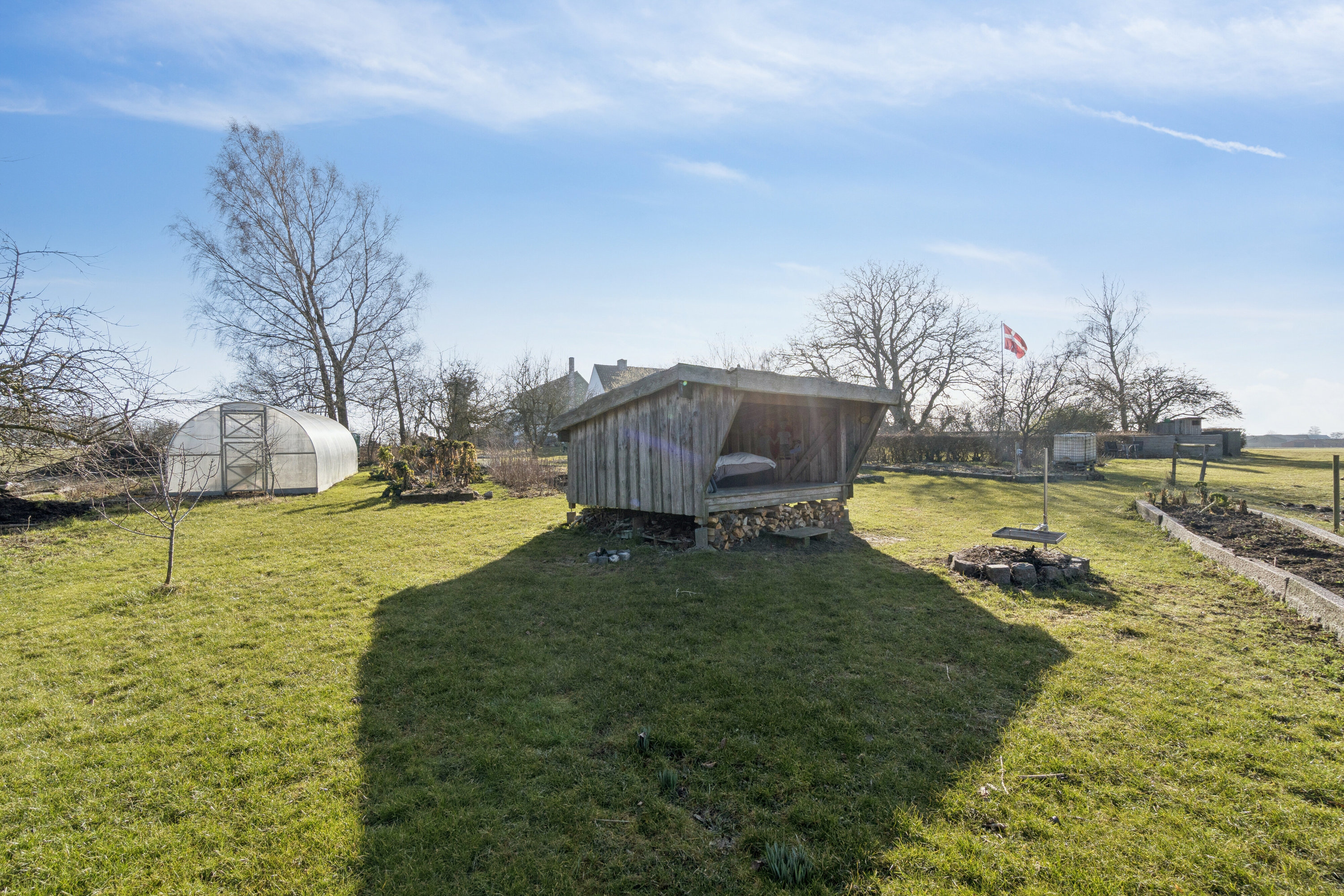 Fremhævet set fra haven billede i fuldskærmstilstand. Billede af Rønnevej 118, Nylars, 3700 Rønne