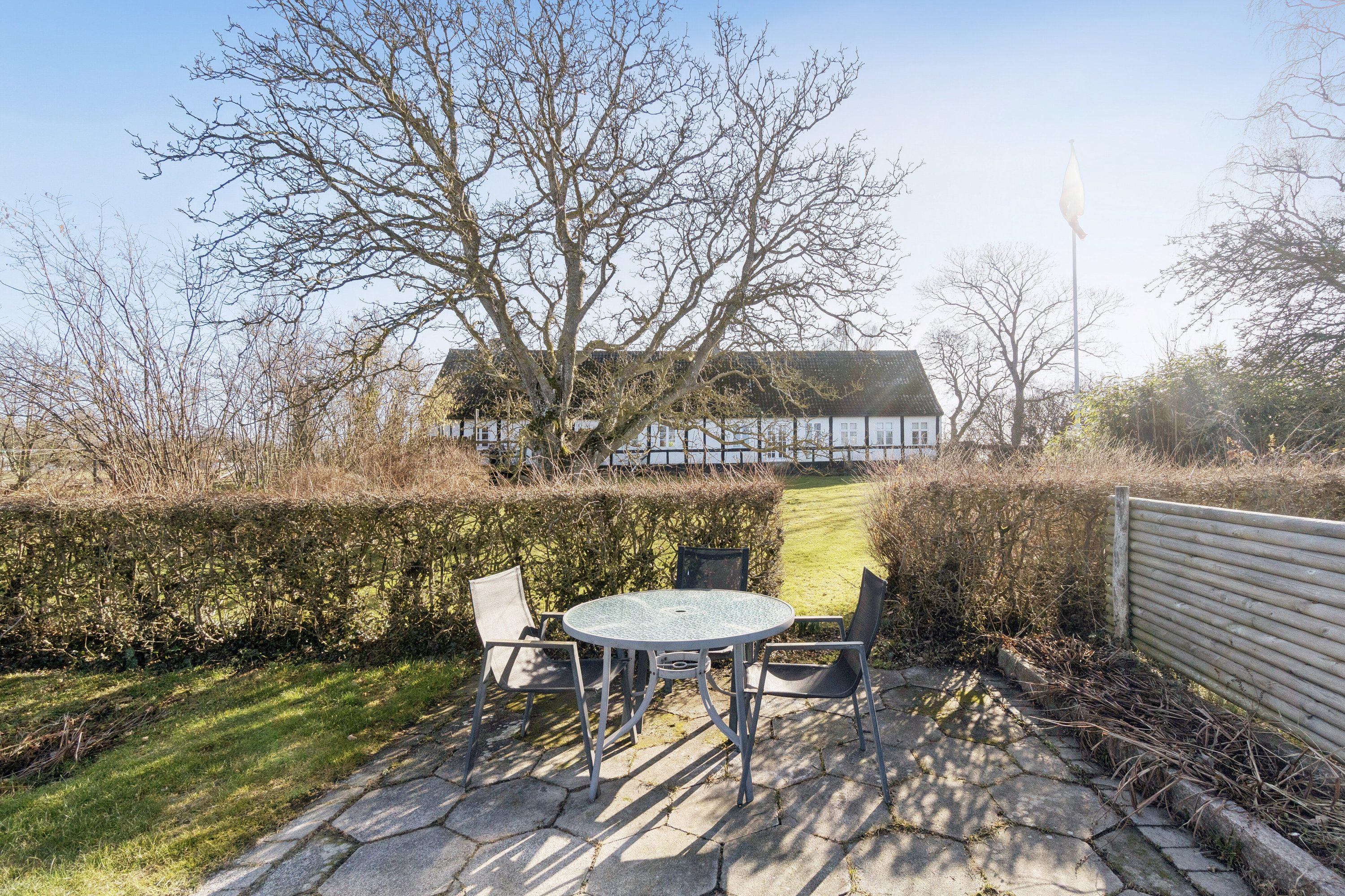 Fremhævet set fra haven billede i fuldskærmstilstand. Billede af Rønnevej 118, Nylars, 3700 Rønne