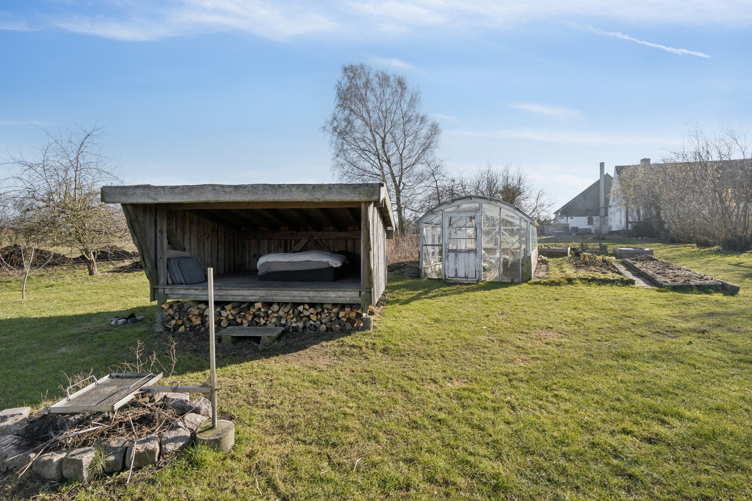 Fremhævet set fra haven billede i fuldskærmstilstand. Billede af Rønnevej 118, Nylars, 3700 Rønne