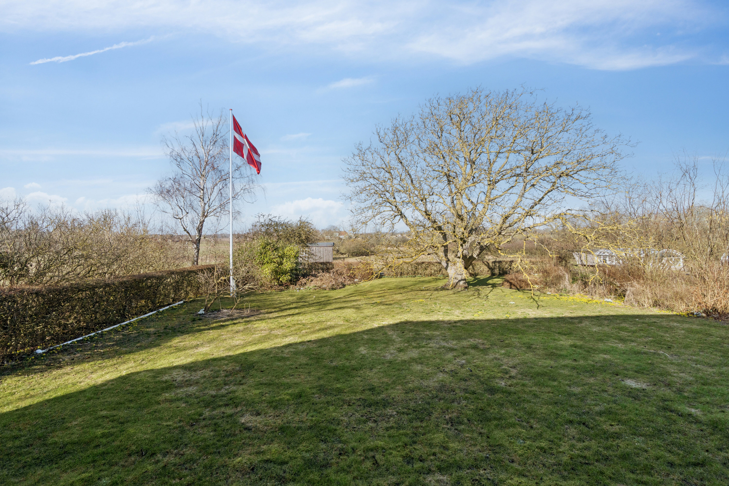 Fremhævet set fra haven billede i fuldskærmstilstand. Billede af Rønnevej 118, Nylars, 3700 Rønne