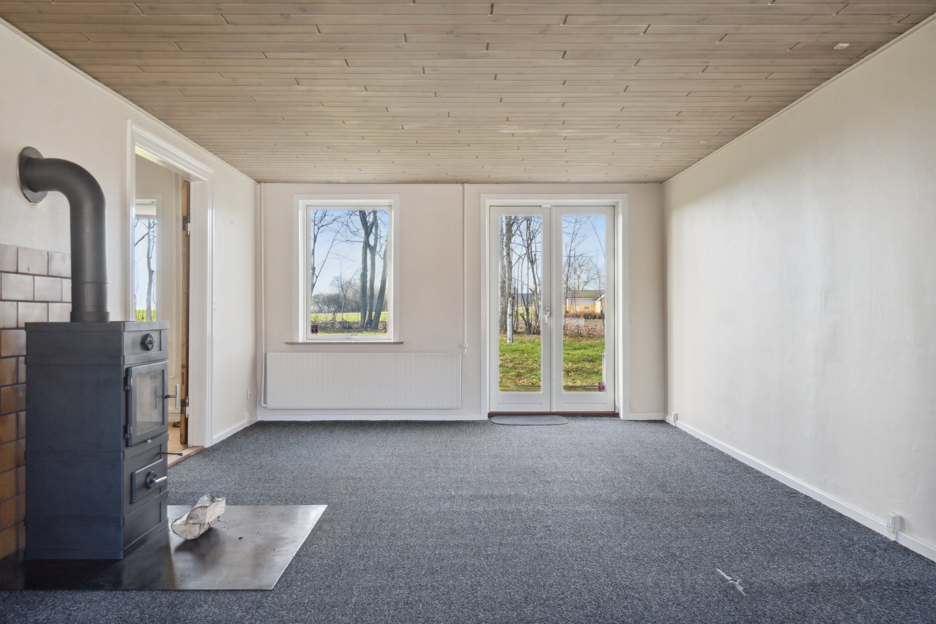 Fremhævet stue billede i fuldskærmstilstand. Billede af Kragerupgårdsvej 23, Tjørnelunde, 4270 Høng