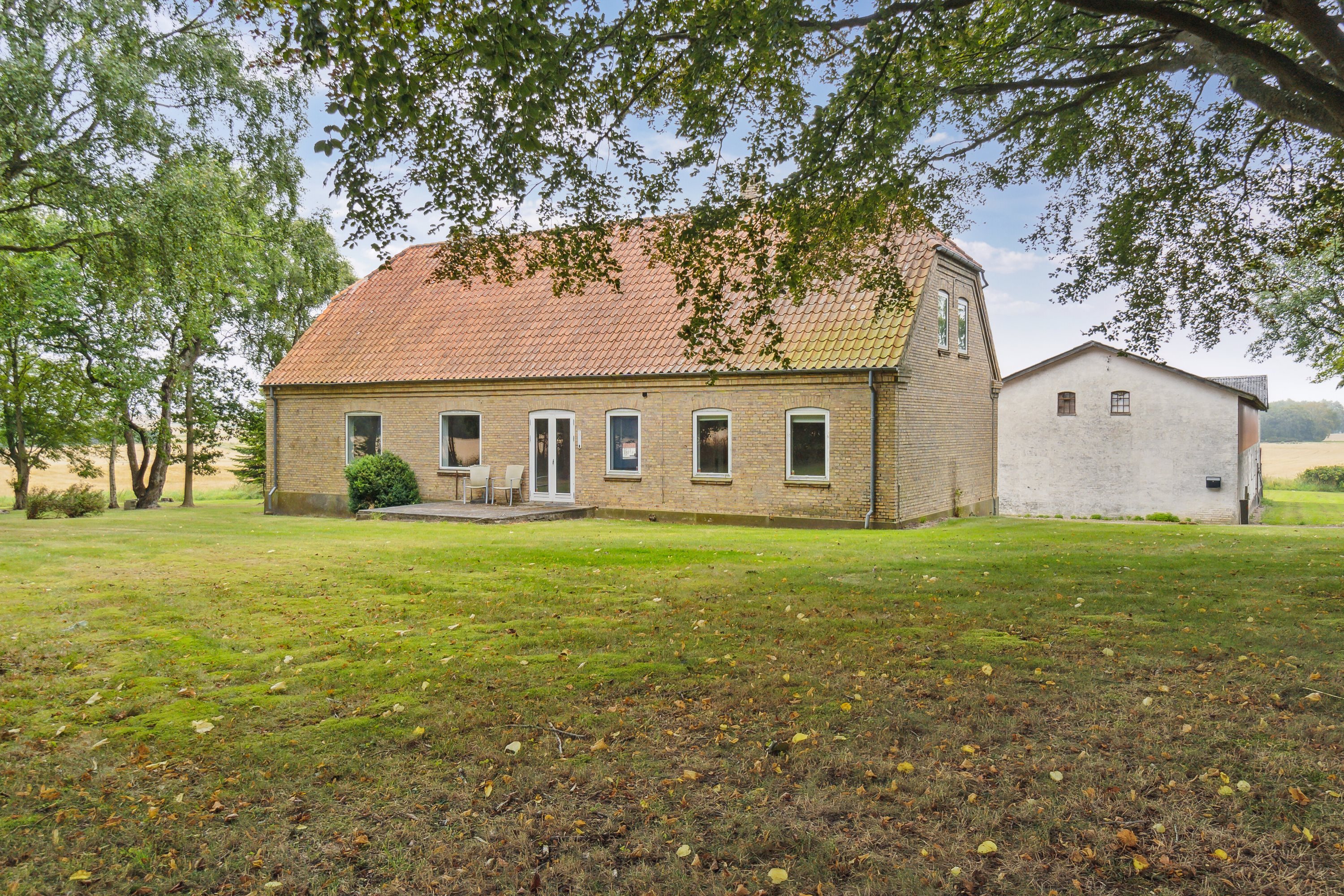 Fremhævet set fra haven billede i fuldskærmstilstand. Billede af Kragerupgårdsvej 23, Tjørnelunde, 4270 Høng