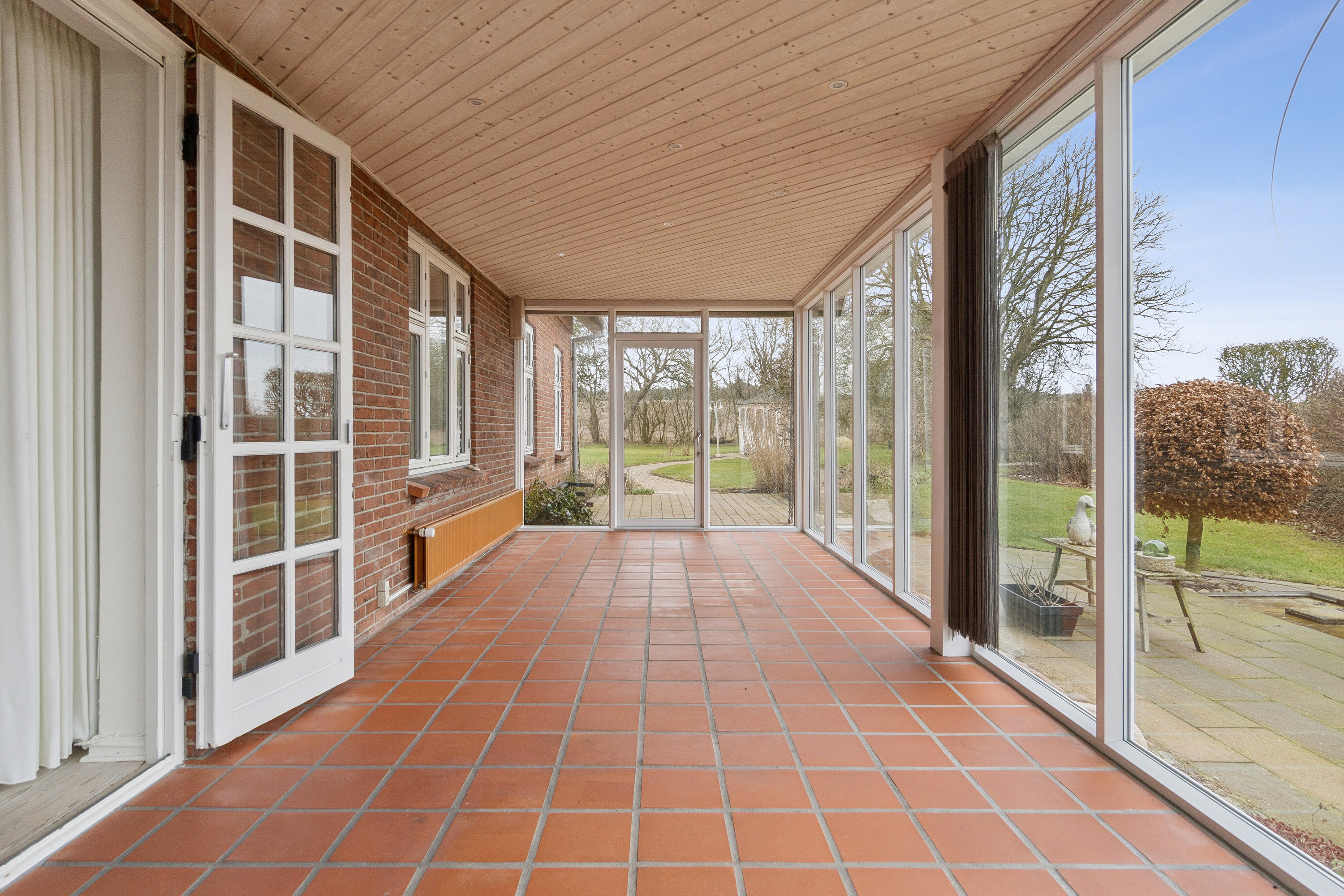 Fremhævet havestue billede i fuldskærmstilstand. Billede af Eshøjvej 1, Fårtoft, 7700 Thisted