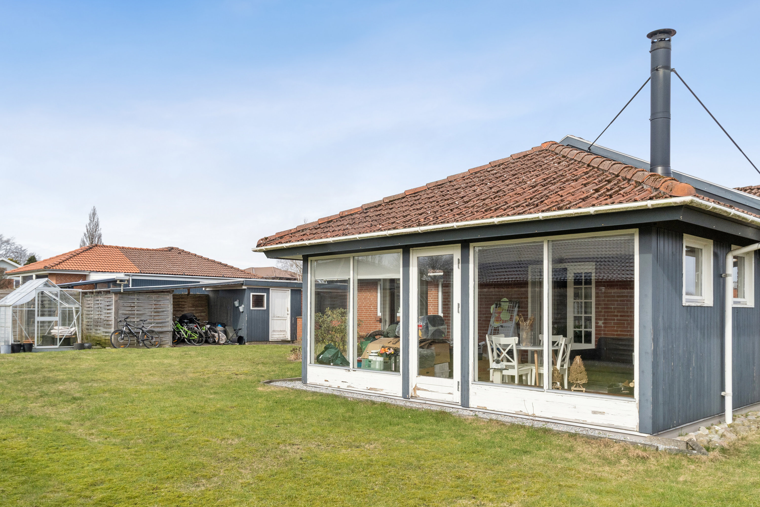 Fremhævet set fra haven billede i fuldskærmstilstand. Billede af Ulstedboparken 8, 9870 Sindal