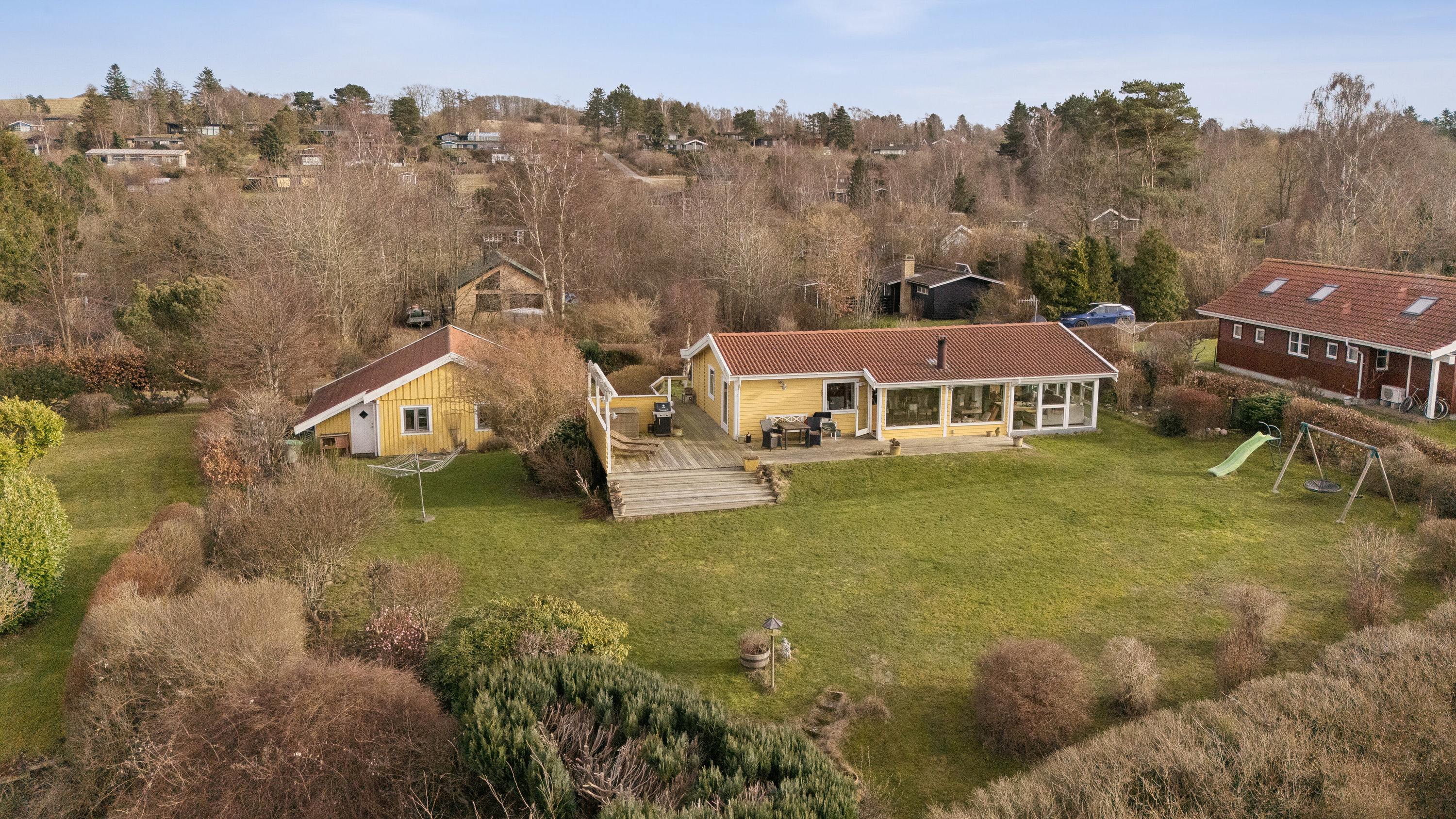 Fremhævet set fra haven billede i fuldskærmstilstand. Billede af Kløverbakken 5, Ordrup, 4540 Fårevejle