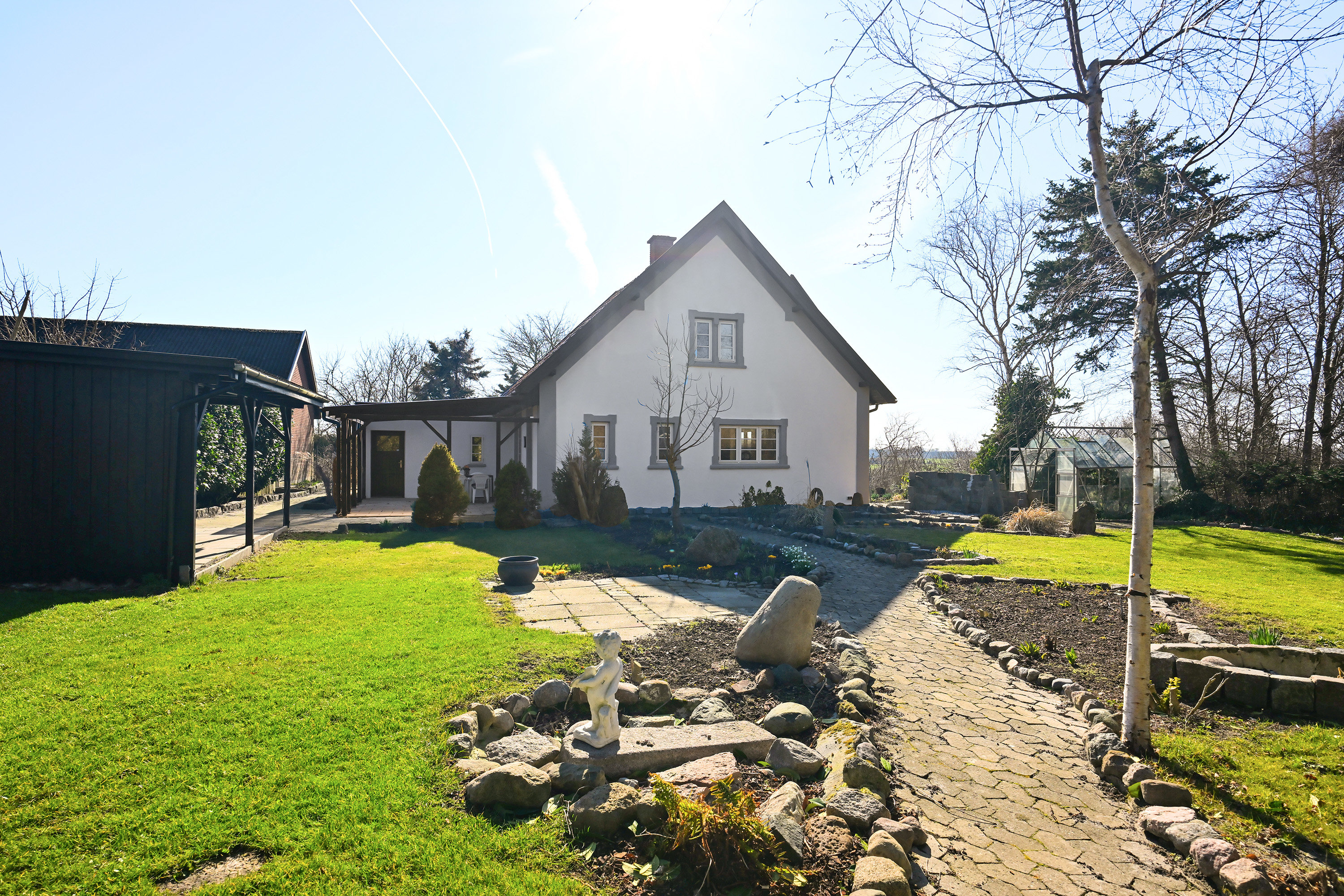 Fremhævet facade havesiden billede i fuldskærmstilstand. Billede af Væggerløsevej 13A, 4873 Væggerløse