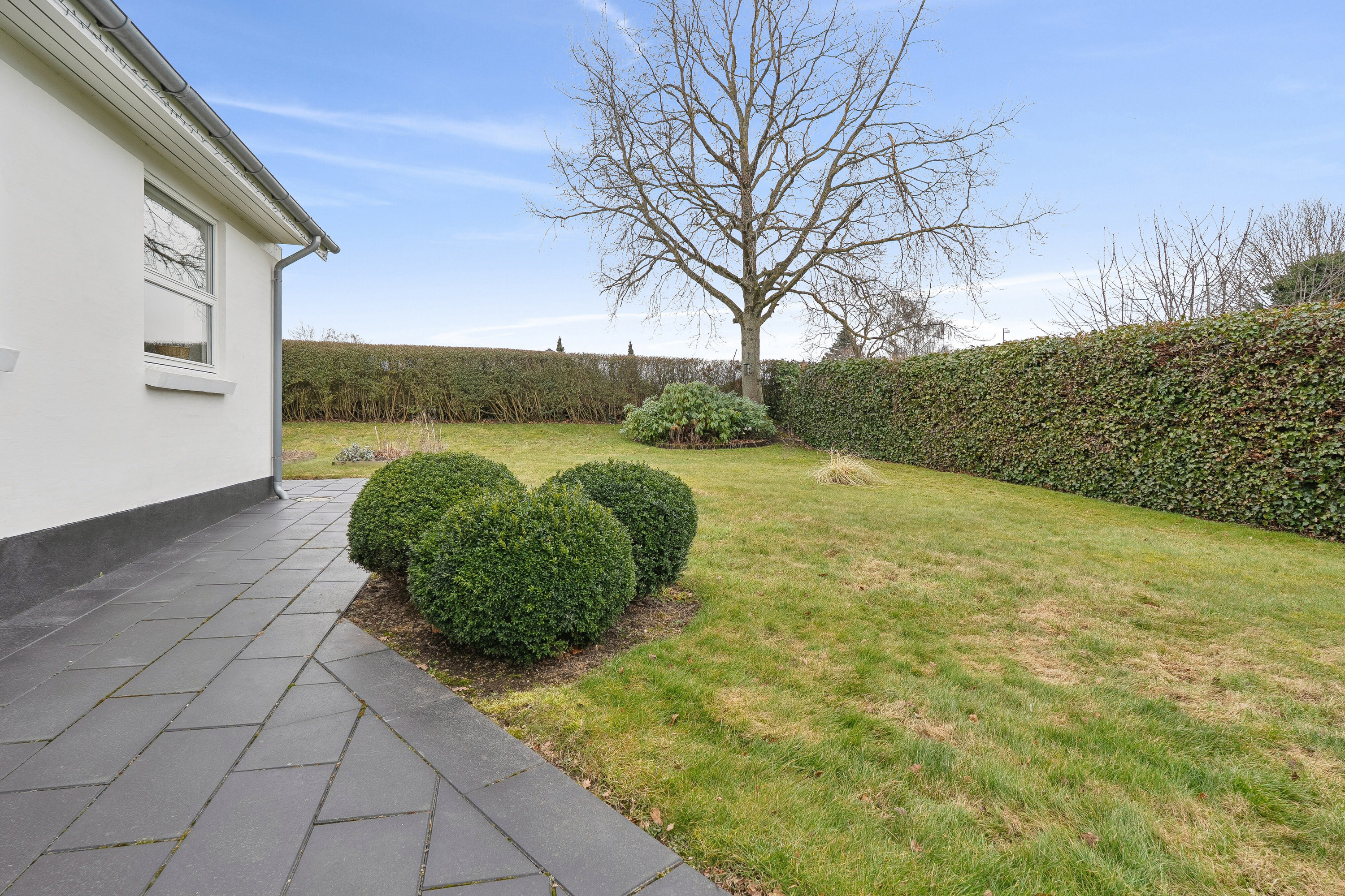 Fremhævet baghave billede i fuldskærmstilstand. Billede af Hjørnehusvej 3, 4720 Præstø