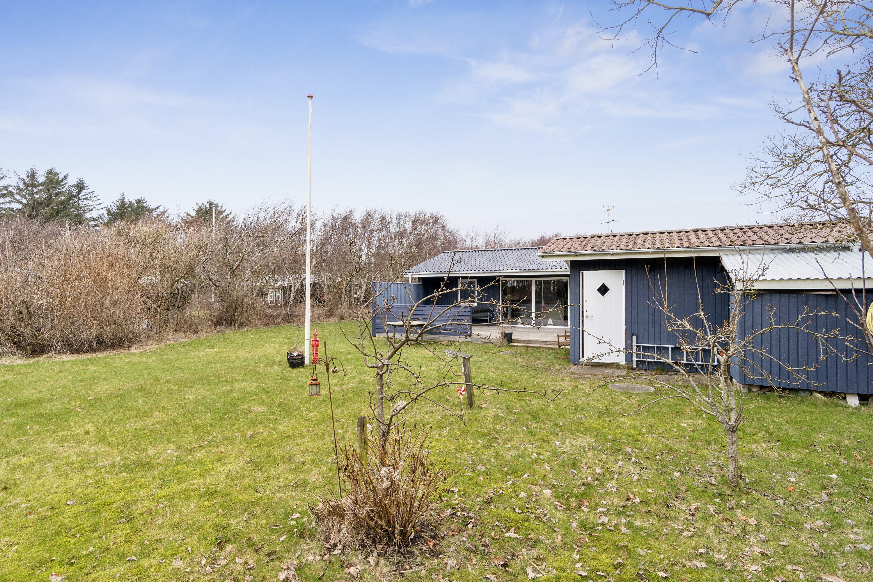 Fremhævet set fra haven billede i fuldskærmstilstand. Billede af Spætmejsevej 13, Draget, 7760 Hurup Thy