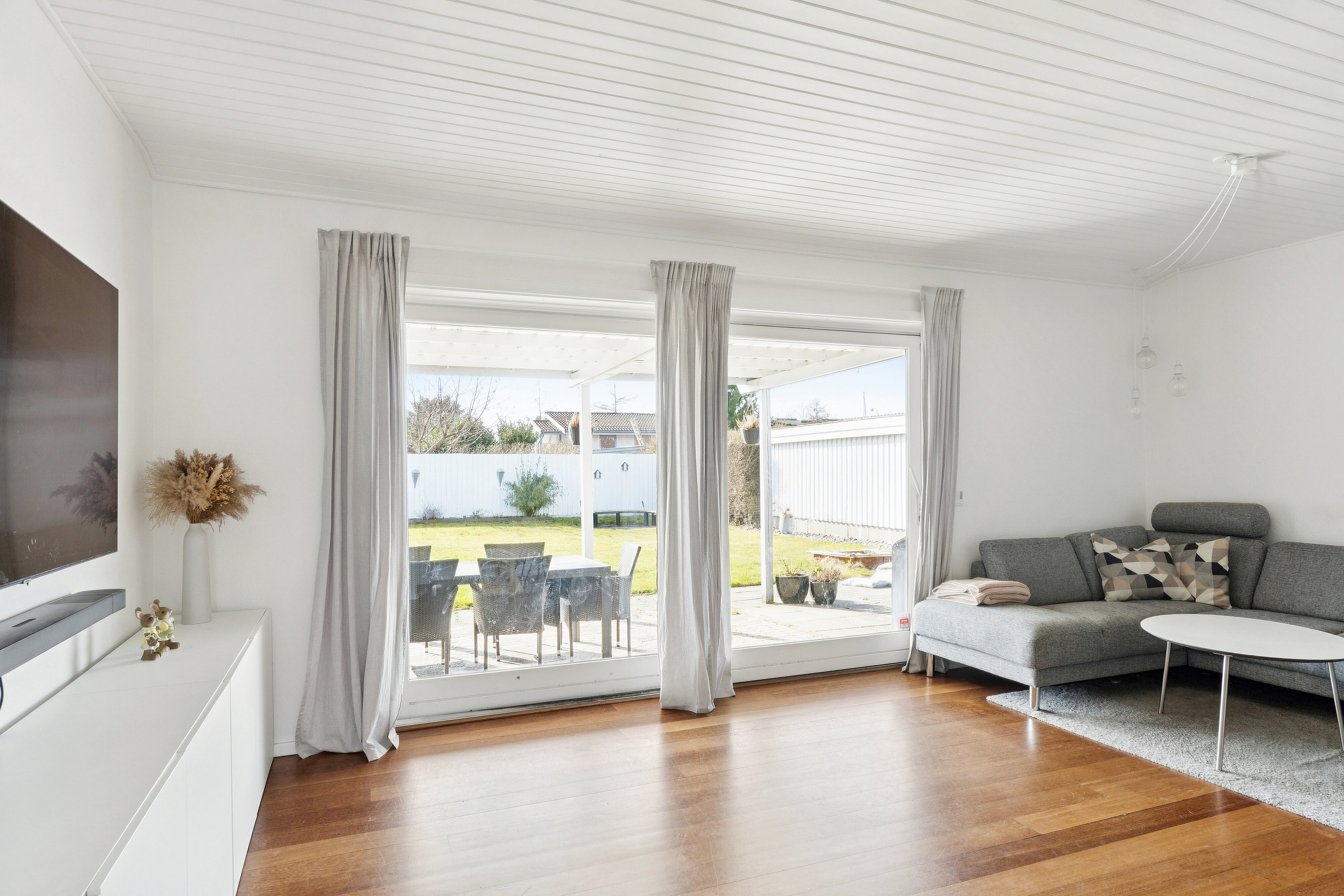 Fremhævet stue billede i fuldskærmstilstand. Billede af Nørremarksvej 21, 2650 Hvidovre