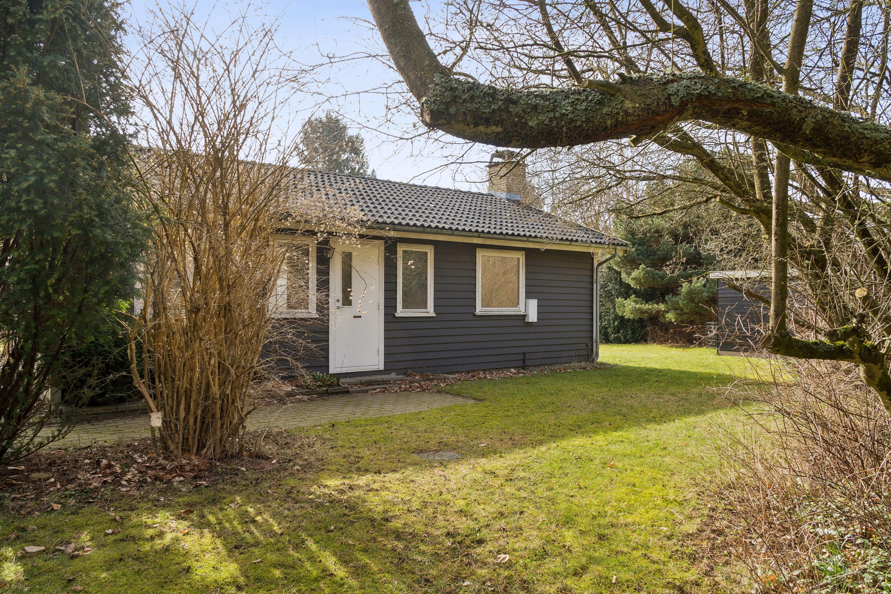 Fremhævet set fra haven billede i fuldskærmstilstand. Billede af Engdraget 17, Gudmindrup Lyng, 4573 Højby