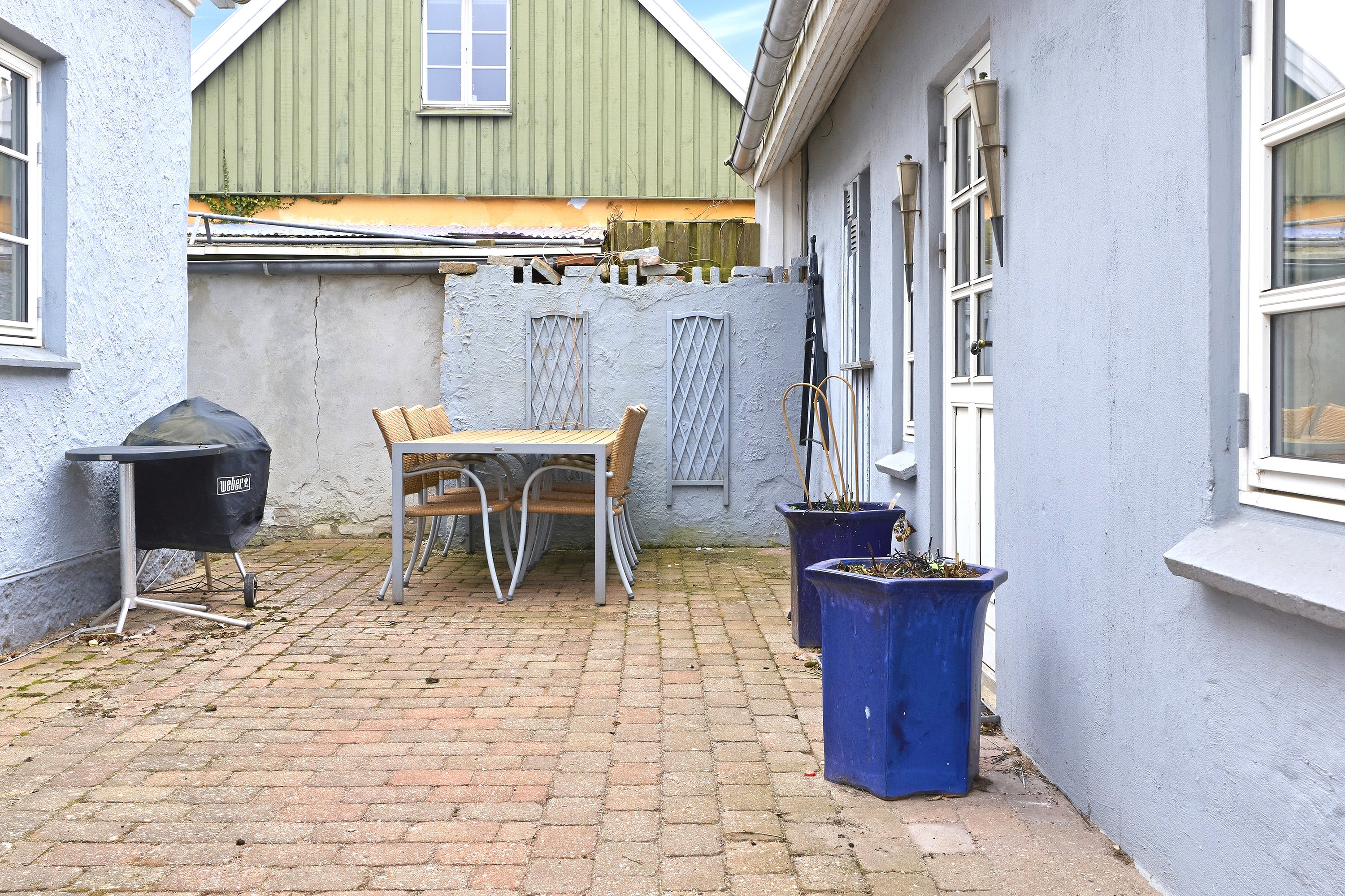 Fremhævet gårdhave billede i fuldskærmstilstand. Billede af Møllegade 8, 3250 Gilleleje