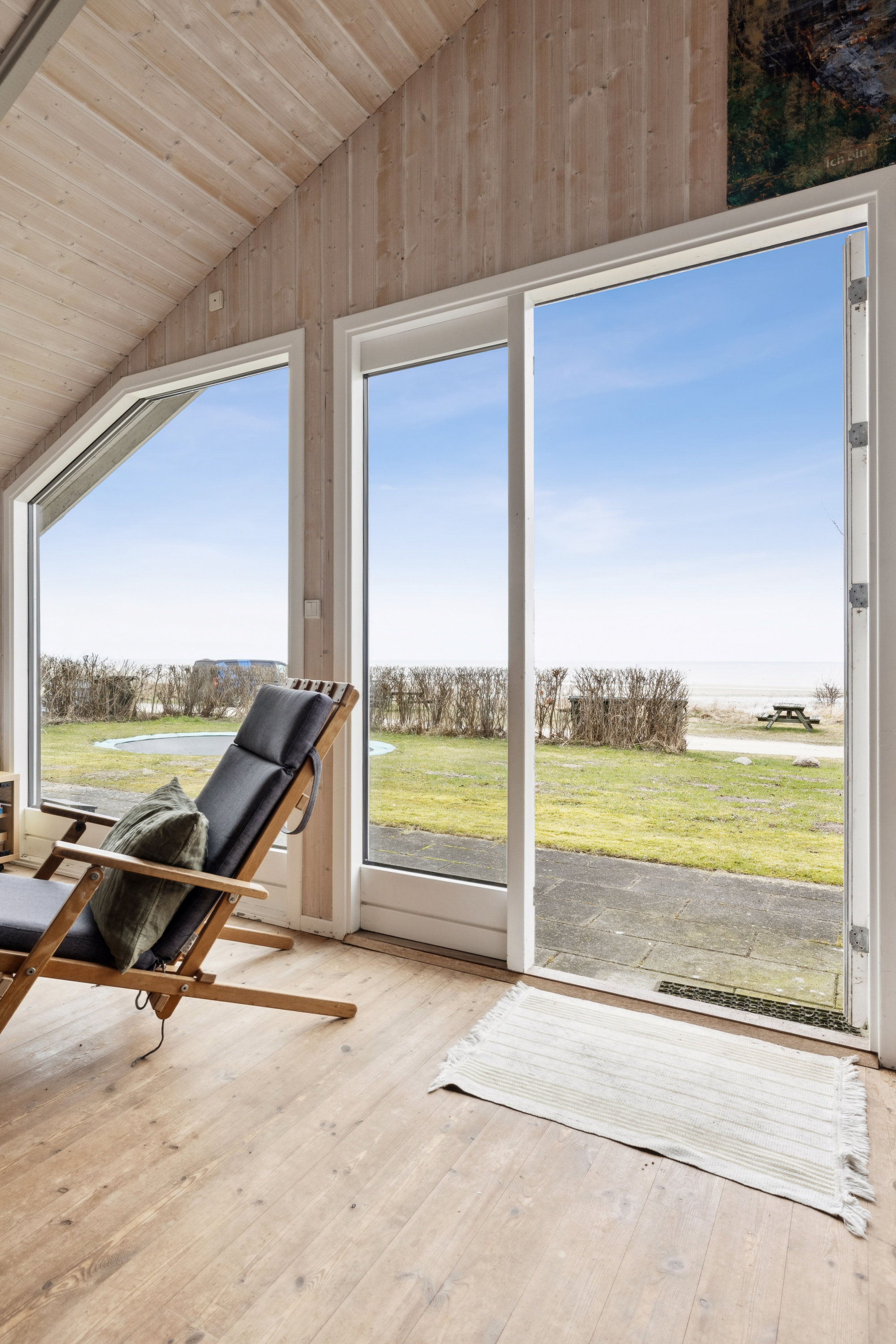 Fremhævet stue billede i fuldskærmstilstand. Billede af Ved Stranden 30, Lystrup Strand, 8961 Allingåbro