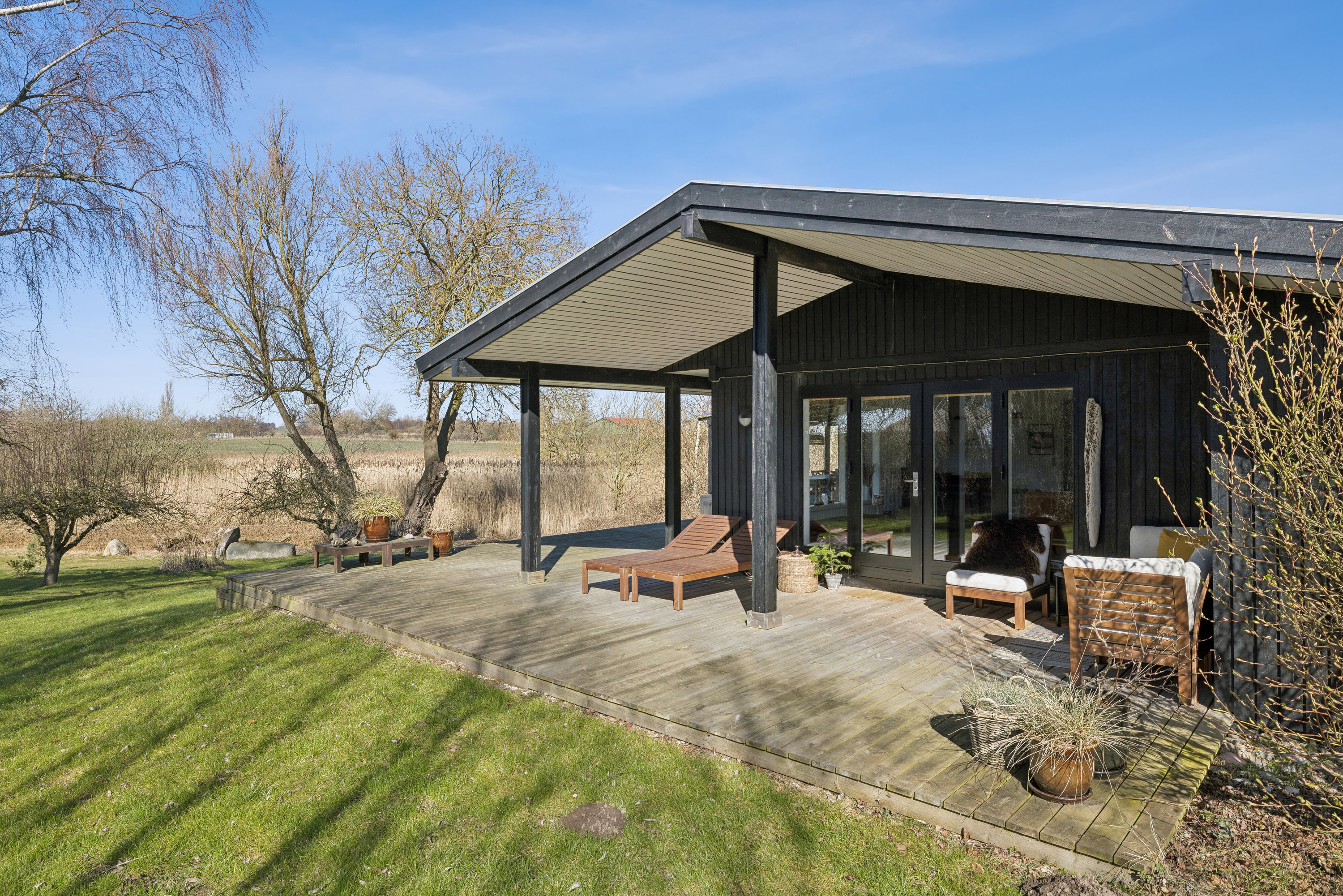 Fremhævet set fra haven billede i fuldskærmstilstand. Billede af Laxtonvej 28, Fredmose, 5932 Humble